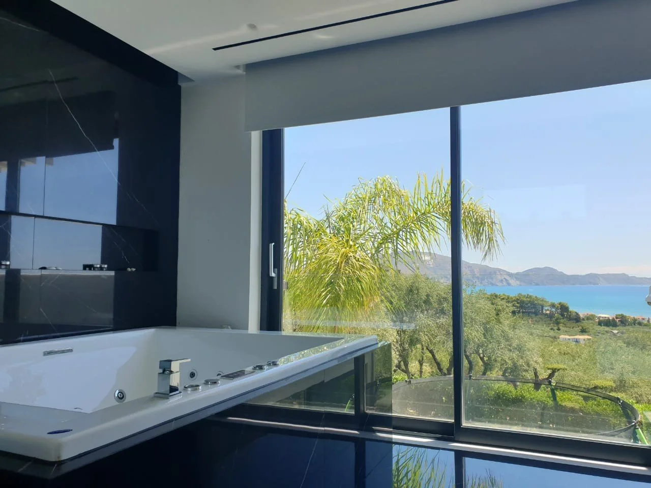 Luxury bathroom with sea and valley view in a private villa in Zakynthos – Levante Villas