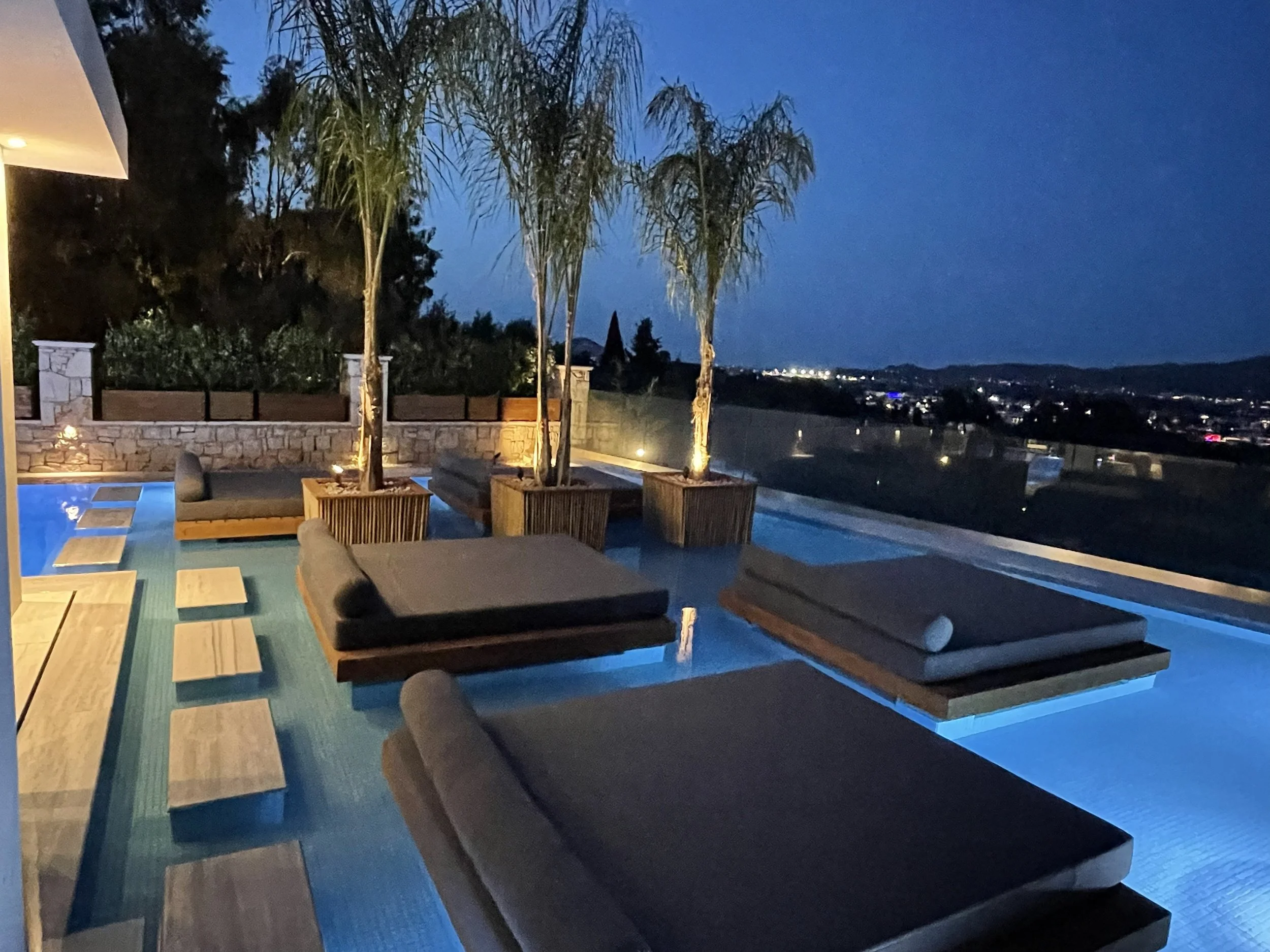 Villa Polyxeni private swimming pool at night with sea view in Zakynthos