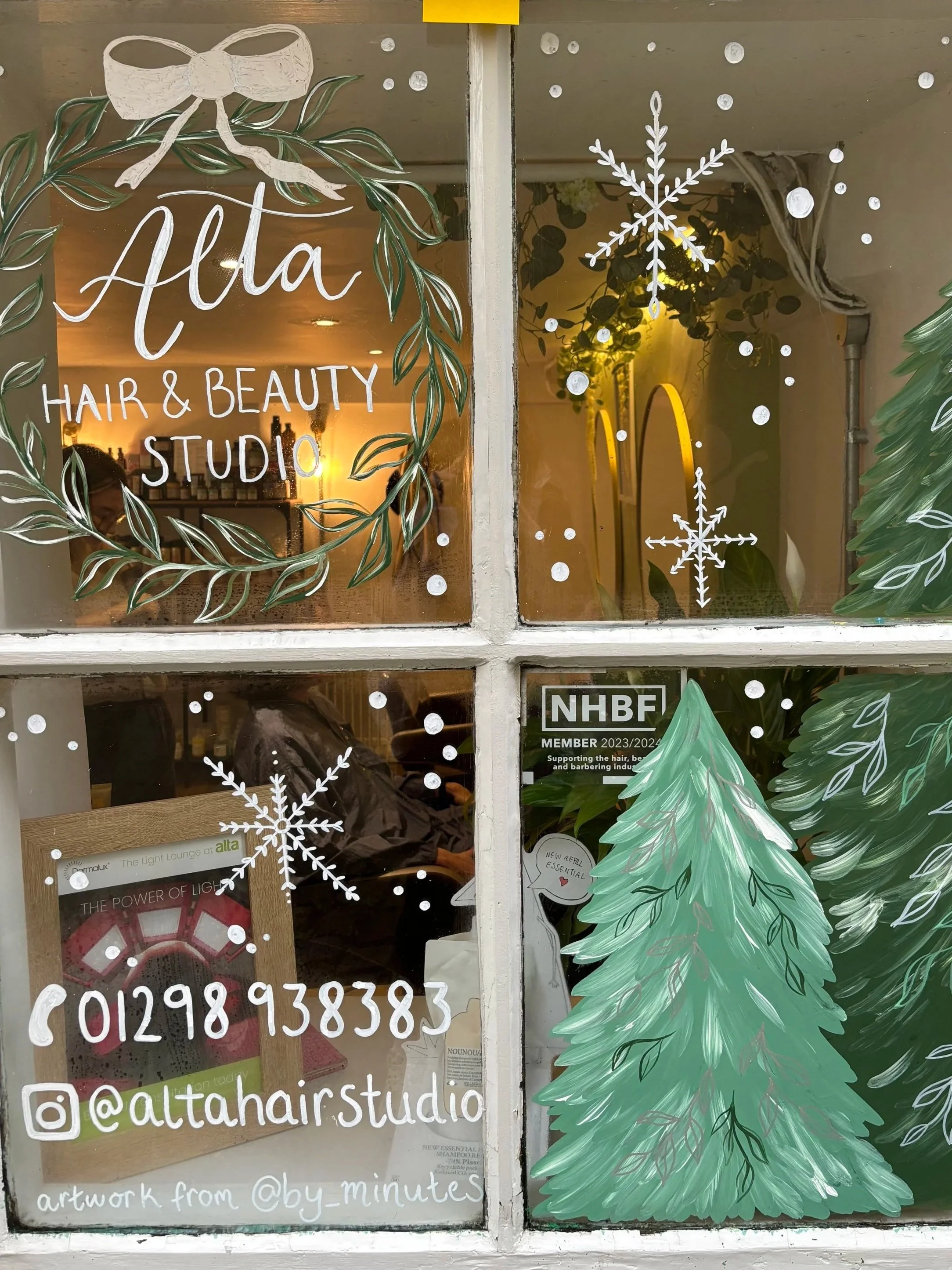 Eco friendly values Christmas window design hand painted hair salon window. 