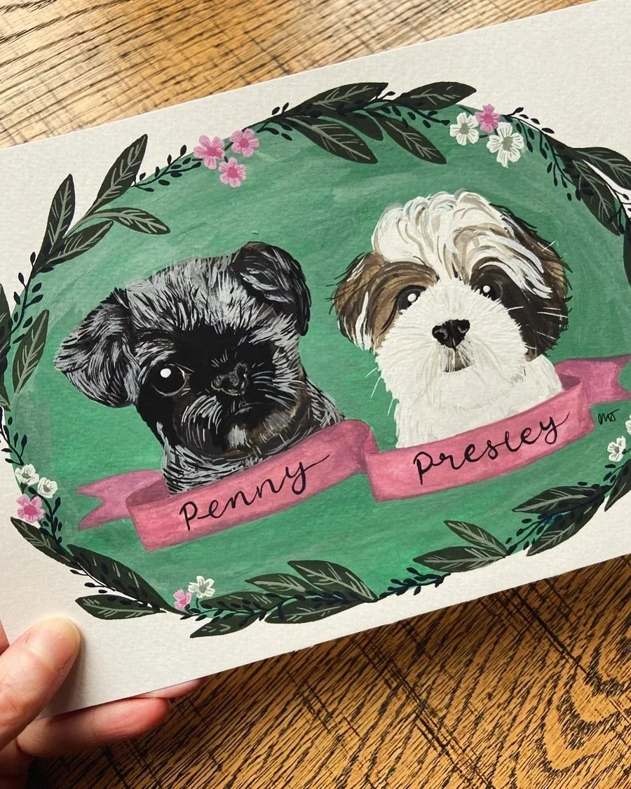Two dogs in a pet portrait that has been hand painted in gouache and watercolour. The image is two dogs surrounded by flowers, with their names in a banner underneath. 