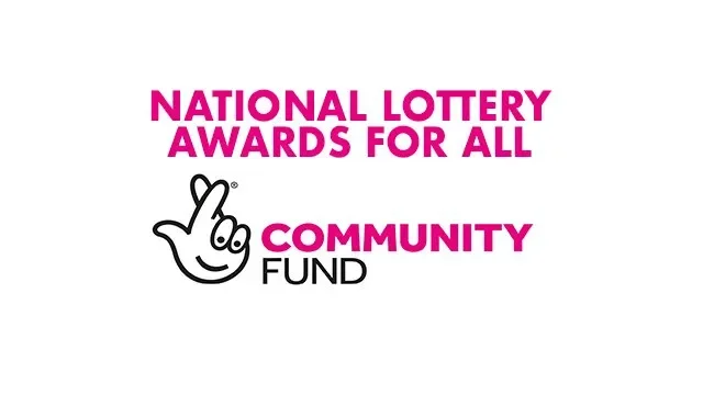 Text reading "National Lottery Awards for All Community Fund" with a cartoon hand making a peace sign
