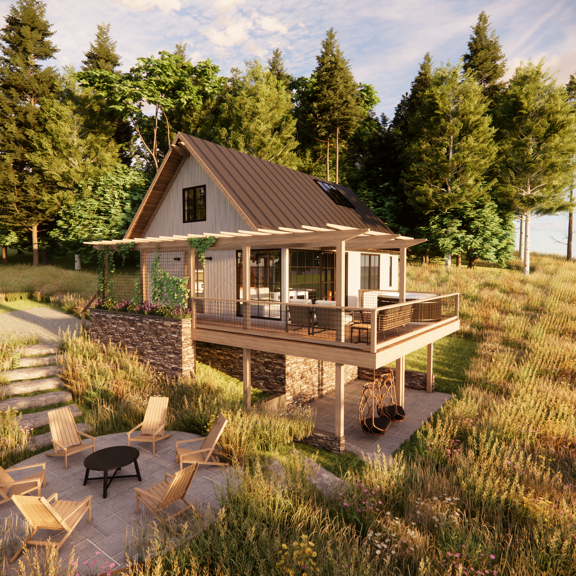 A modern house with a sloped roof and large glass windows, raised on stilts with a spacious balcony overlooking a garden patio with chairs and a table, set in a lush green landscape with tall trees.