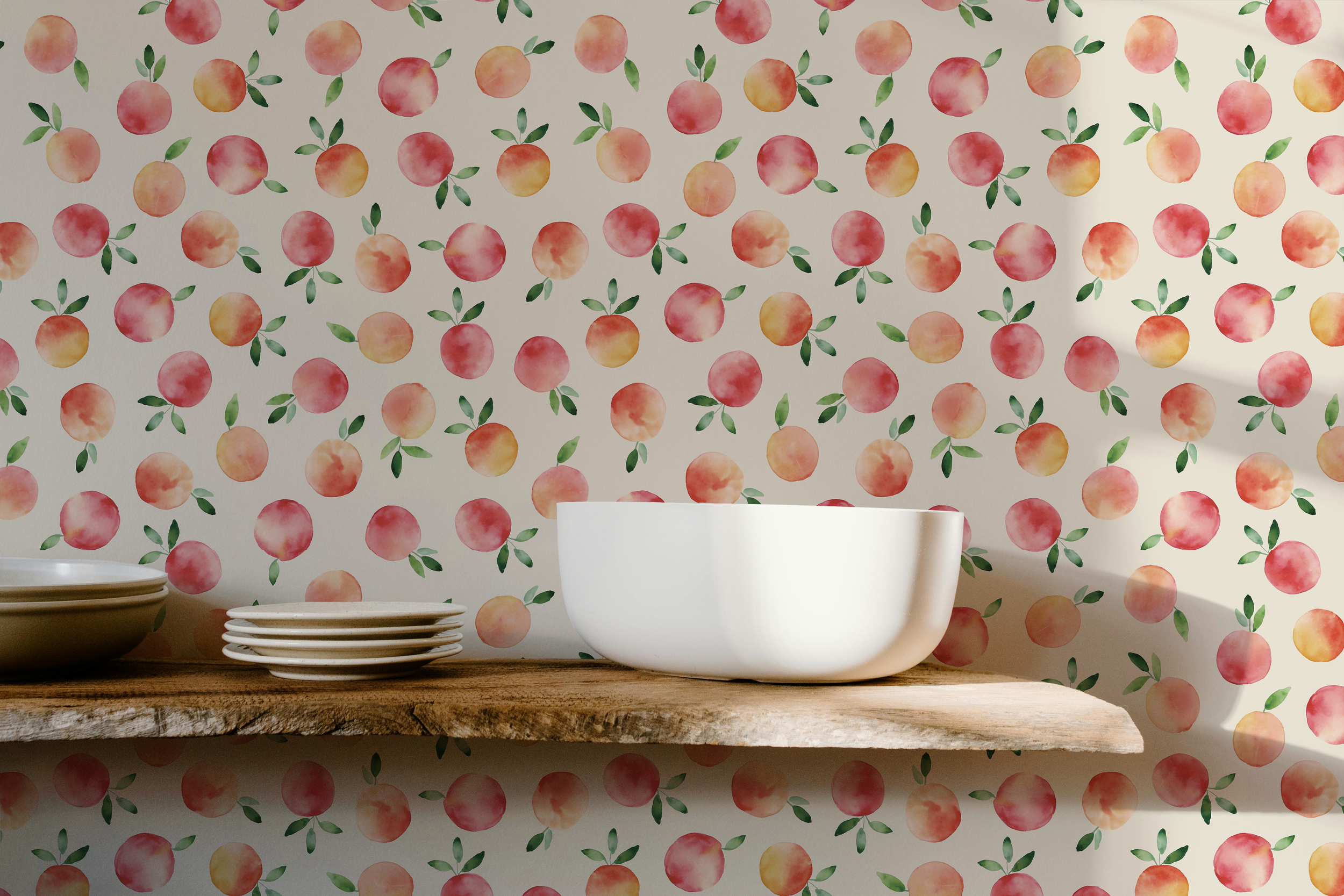 A rustic wooden shelf with stacked plates and a white bowl against a wallpapered wall decorated with a pattern of peaches and green leaves.