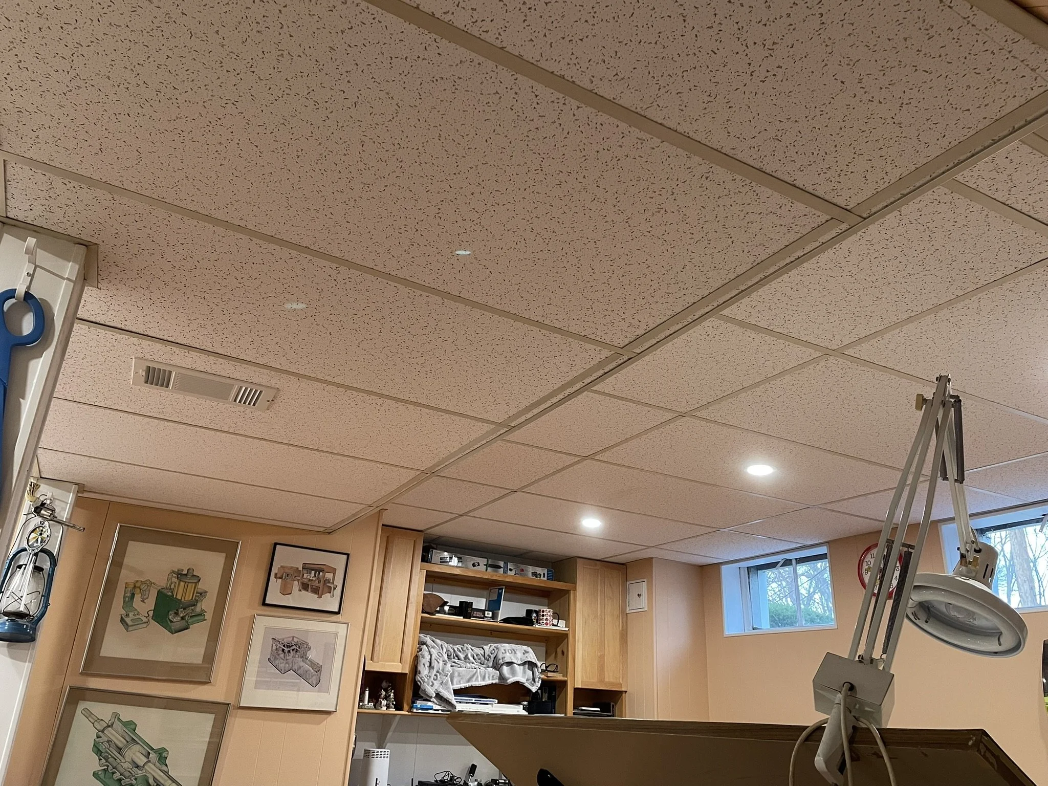 Art Studio/Rec Room Upgrade: This project started with a request to replace some sagging and discolored acoustic ceiling tiles and replace the large fluorescent light fixtures with compact and efficient recessed LED fixtures. 

 However, upon removin