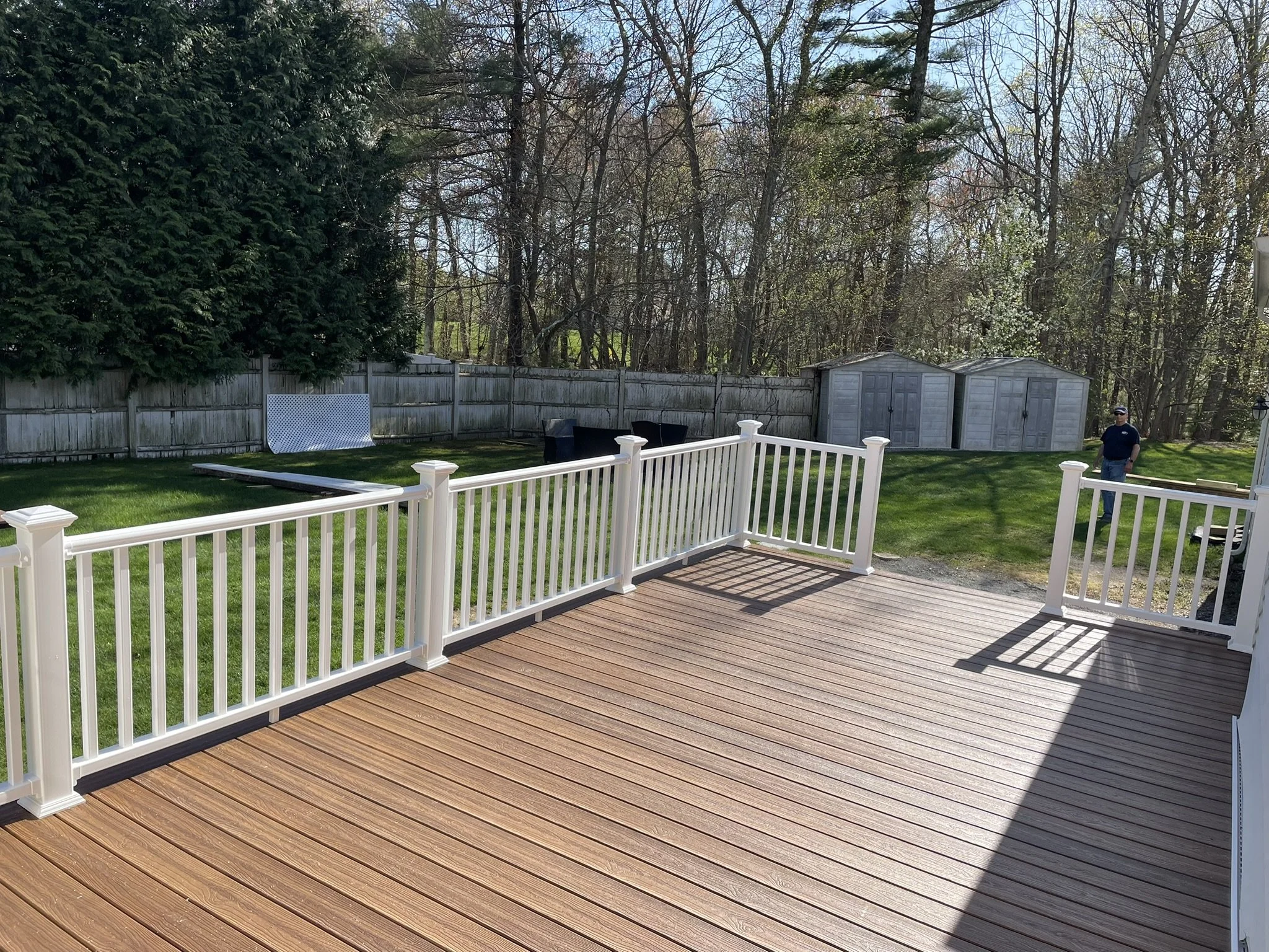 300 S.F. Deck Replacement: The original wood deck, railings and trim overlooking this large, sunny and private back yard had degraded to the print that there were valid safety concerns, not to mention the obviously aesthetic impact. After cutting bac