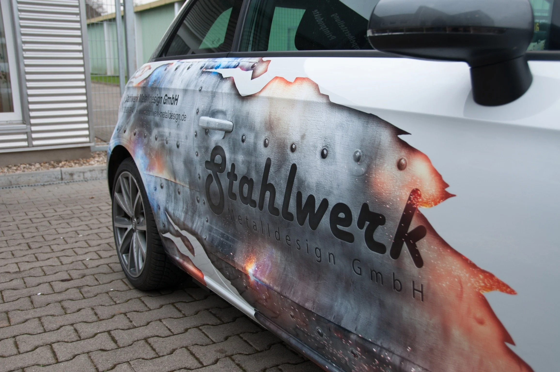Seitenansicht der Audi A1 Fahrzeugbeschriftung