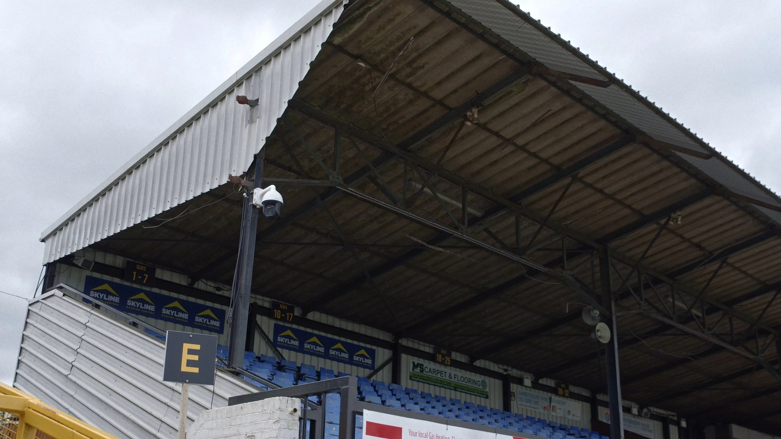 A static shot of a grassroots football stadium