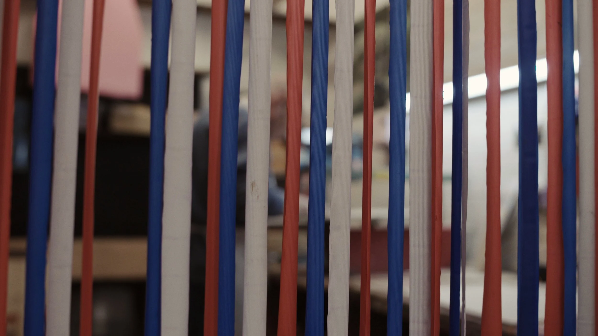 Rob Roy is in the background working on a new piece