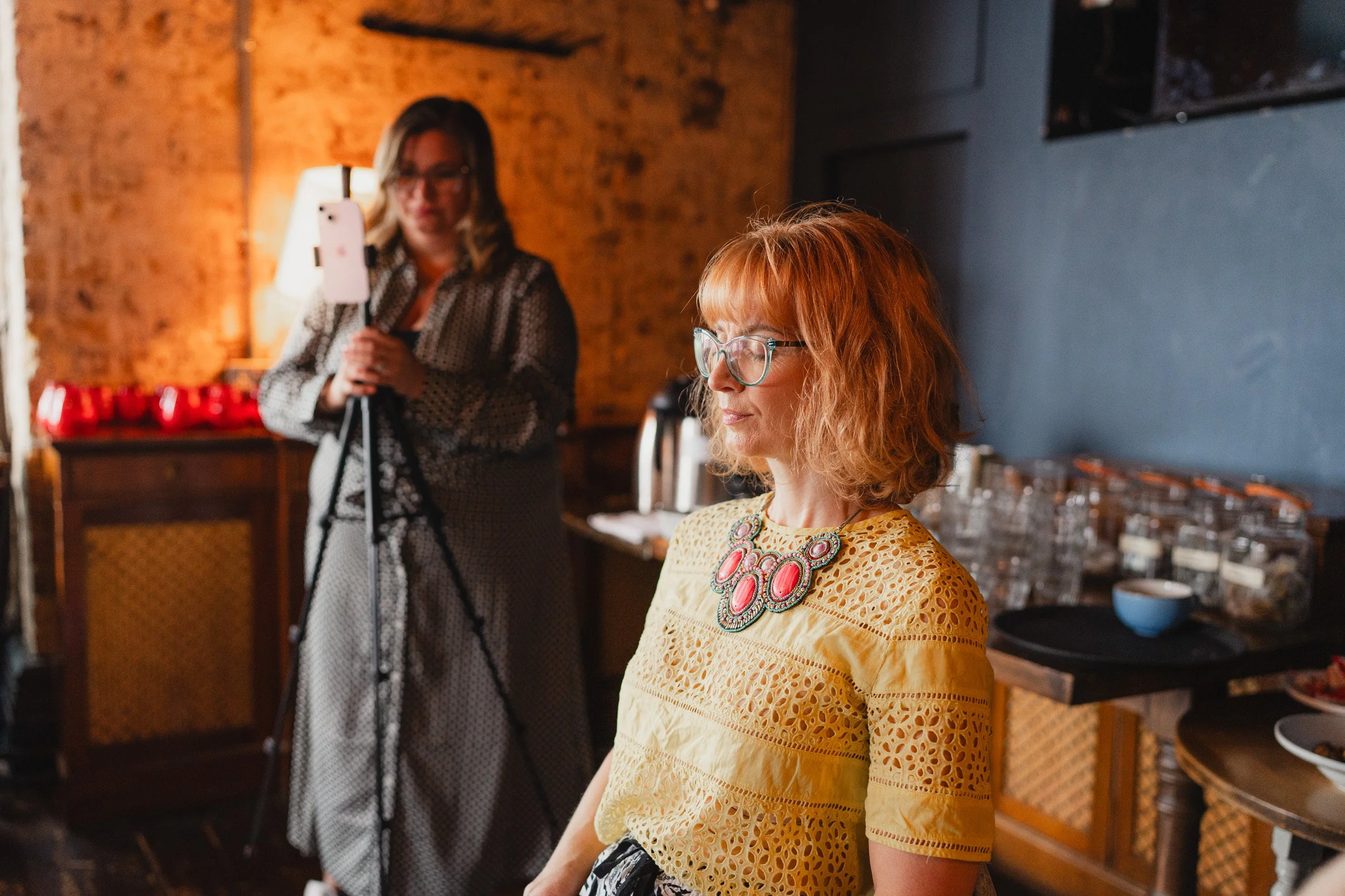 Woman meditating at a women in business workshop in Hackney London