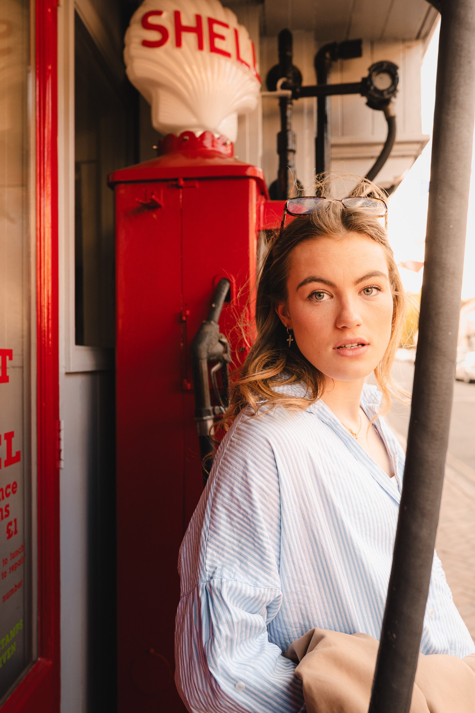 School leaver portrait at a vintage petrol station during golden hour in Great Missenden, Buckinghamshire