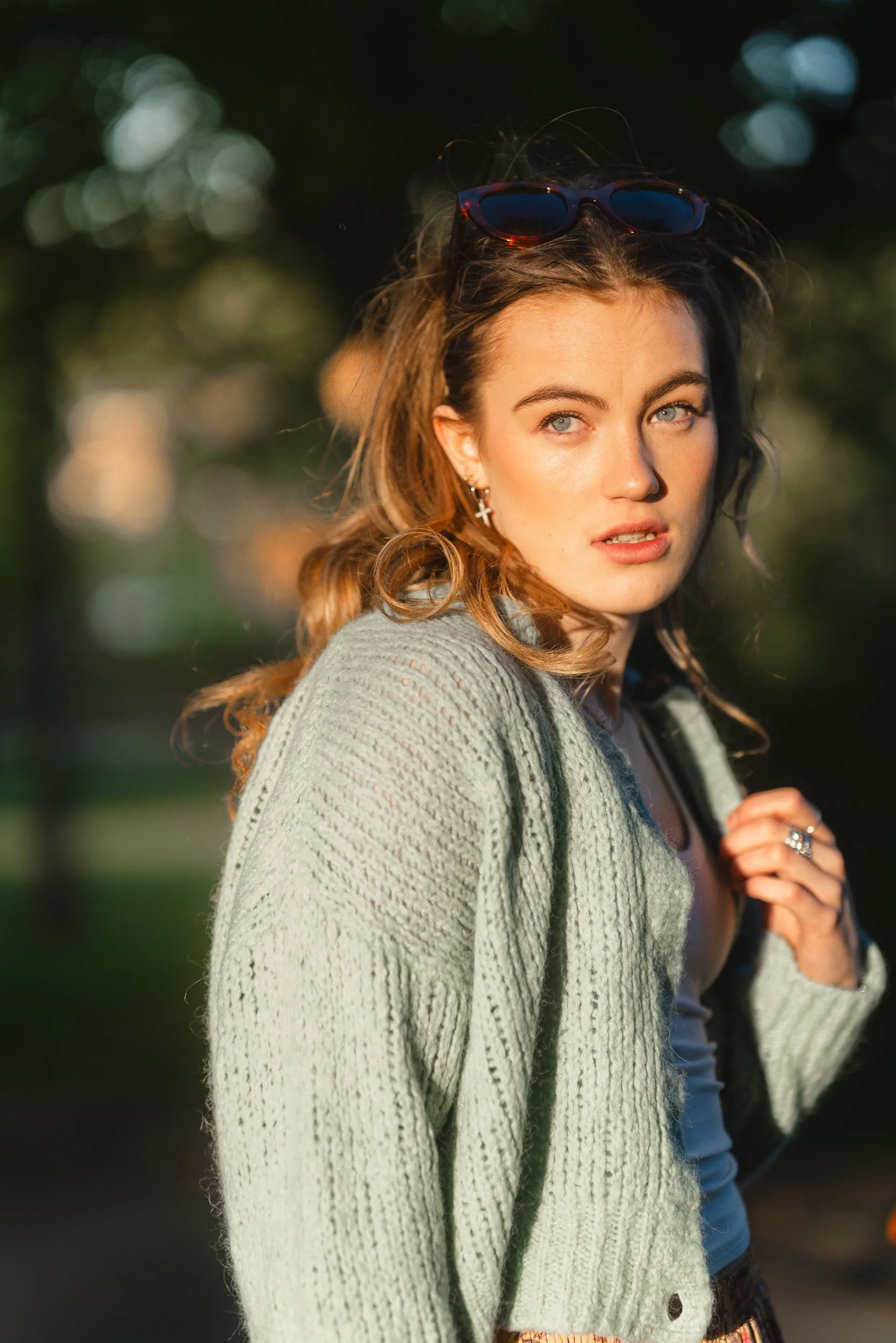 Portrait  of a young girl in the park at golden hour from a  school leaver photography session in Amersham, Buckinghamshire