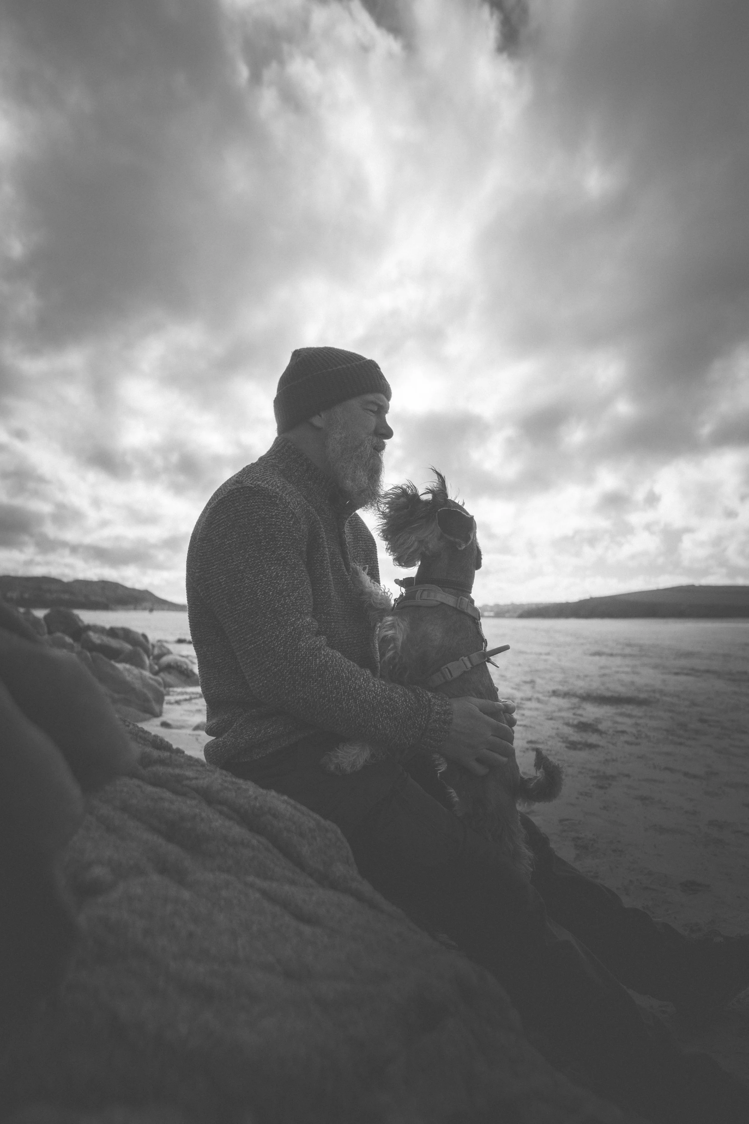 Silhouette of my husband and dog on the beach at Polzeath in Cornwall