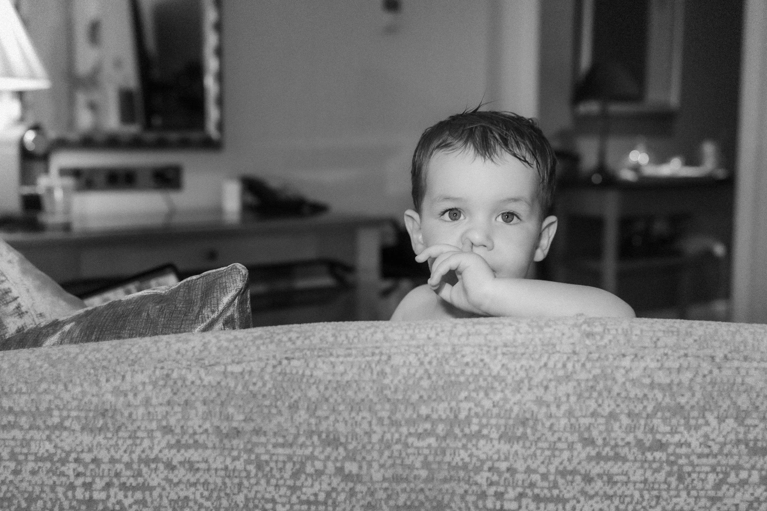 Bride and grooms toddler caught picking his nose in  an elegant suite at The Landmark Hotel in London Marylebone 