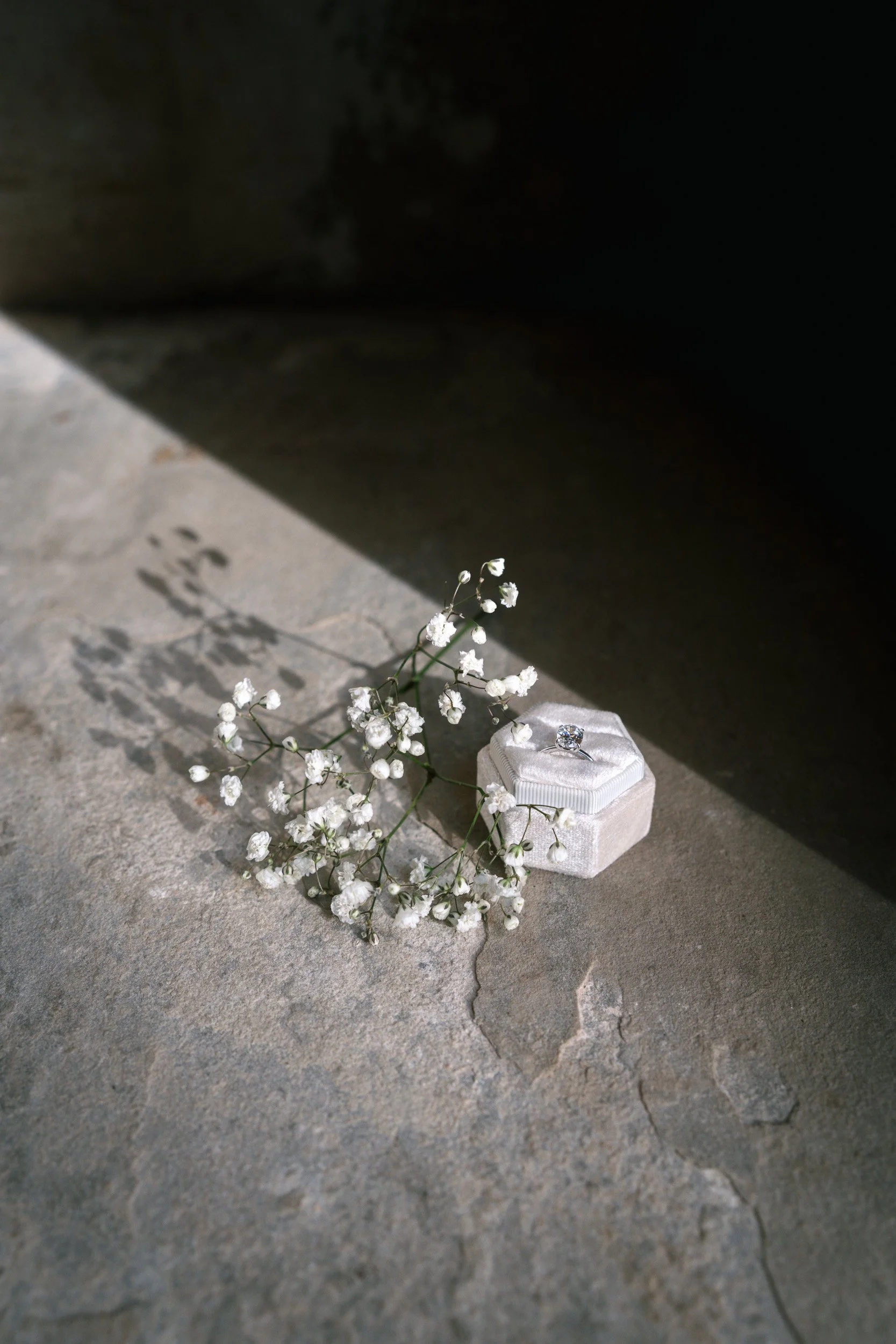 Wedding ring and floral details at The Bell Tower at The Elvetham Hotel in Hampshire
