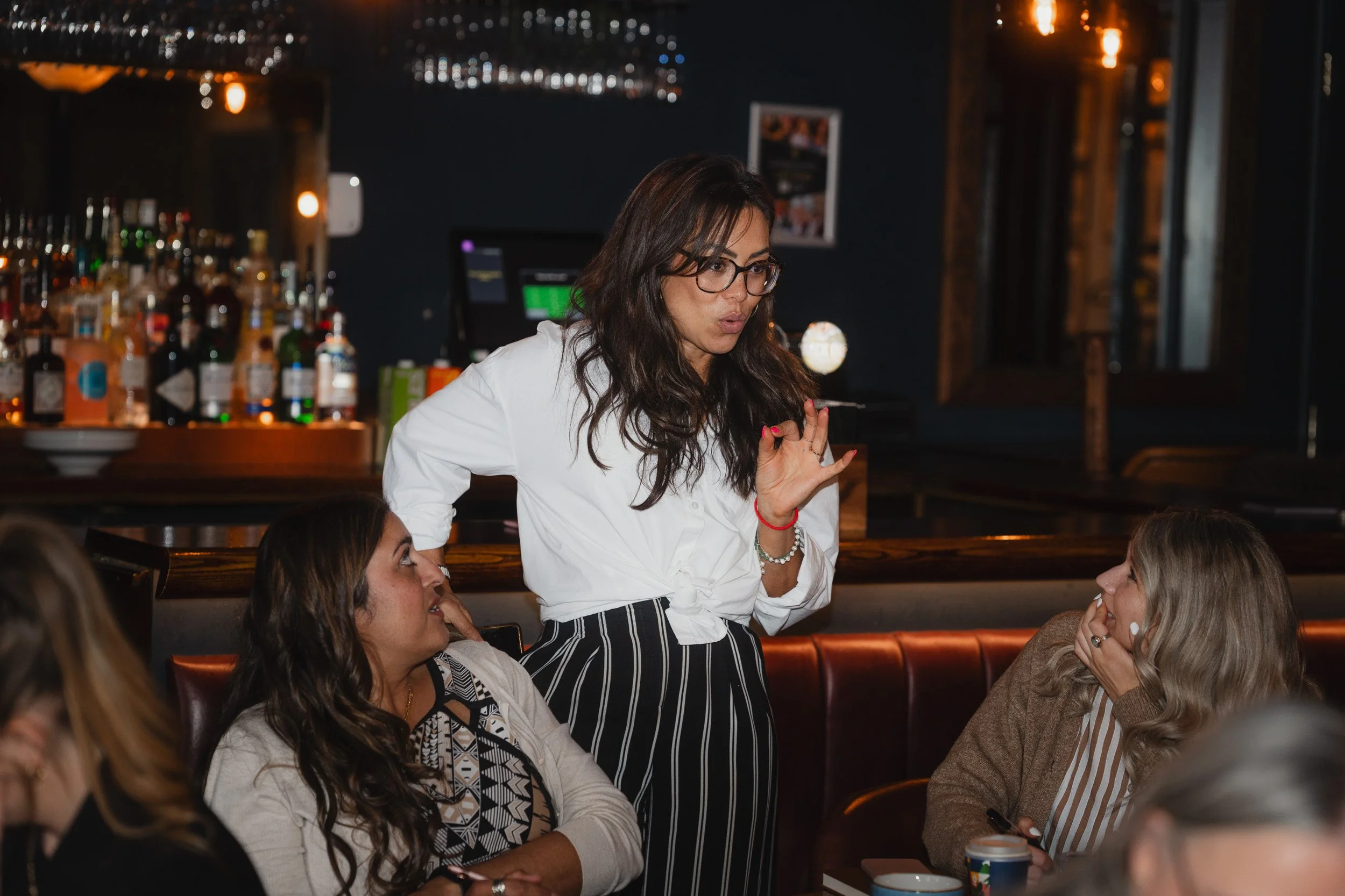 Life coach Alice Dartnell coaching women in business at a women's networking group in Hackney London