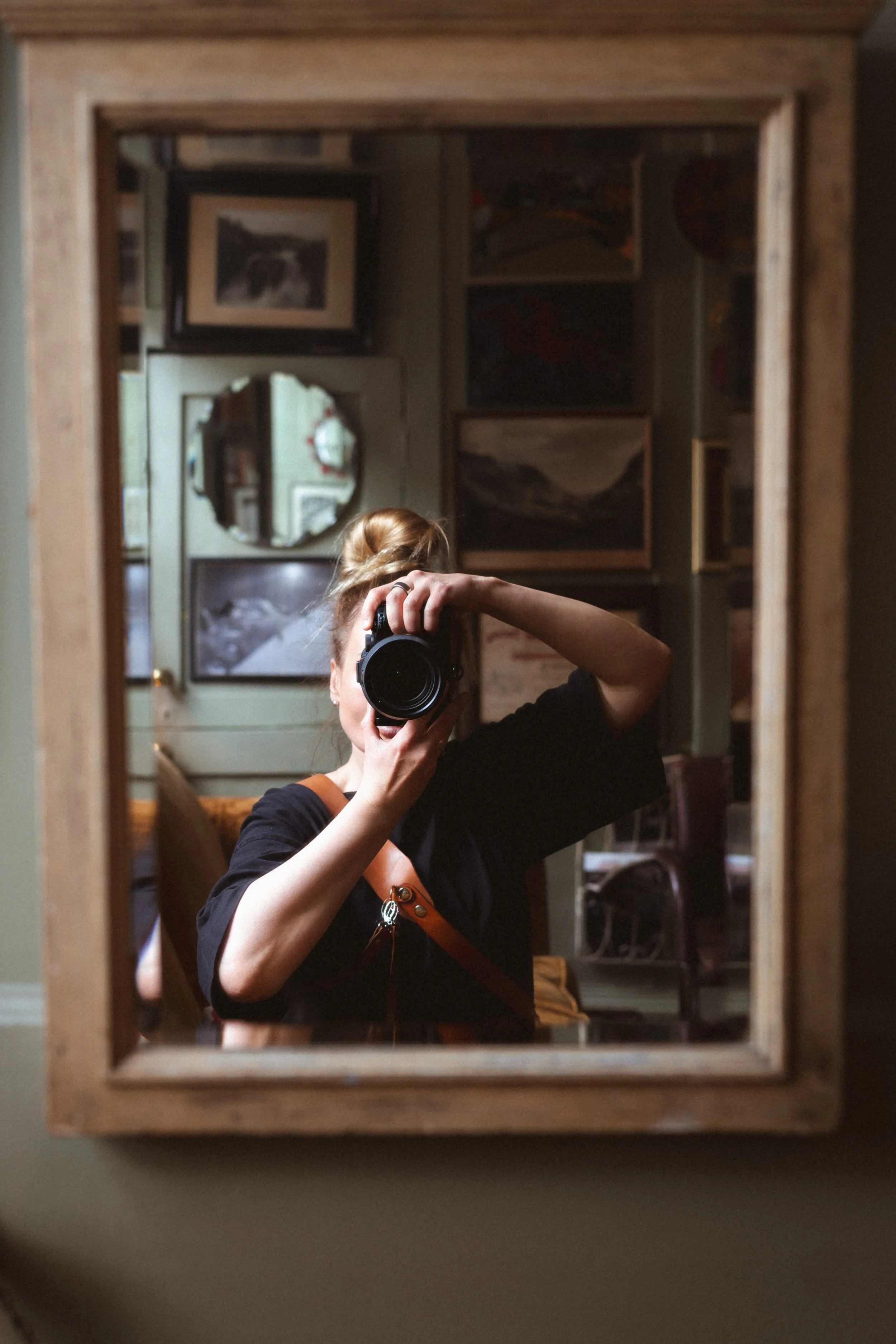 Wedding photographer with camera at The Union Club in Soho during a wedding