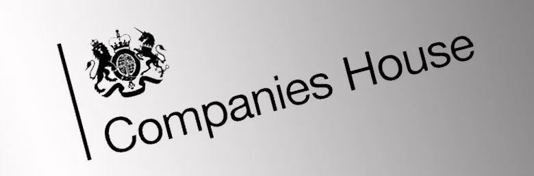 Logo of Companies House with a lion, unicorn, and crown emblem next to the text 'Companies House' on a gray background.