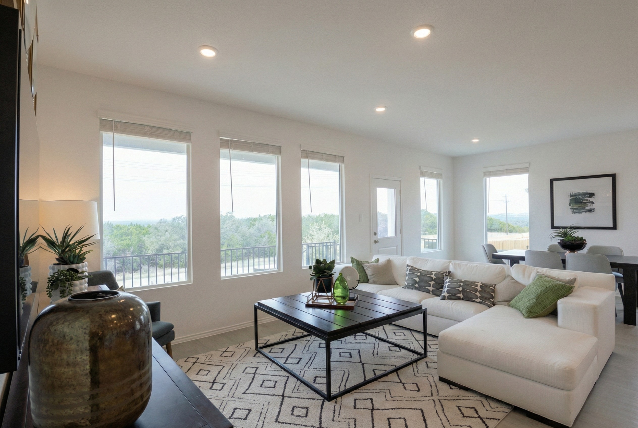Bright and airy living room showcase using the Gold Standard 5-shot bracket.
