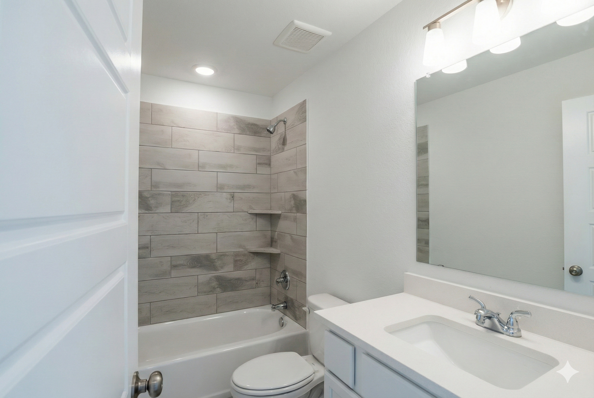 Professional real estate photography of a vacant spare bathroom in a newly built 1,500 sq ft home. High-resolution interior shot for Central Texas listings in Austin, Round Rock, Georgetown, Killeen, Temple, and Waco - Focus Point Media.