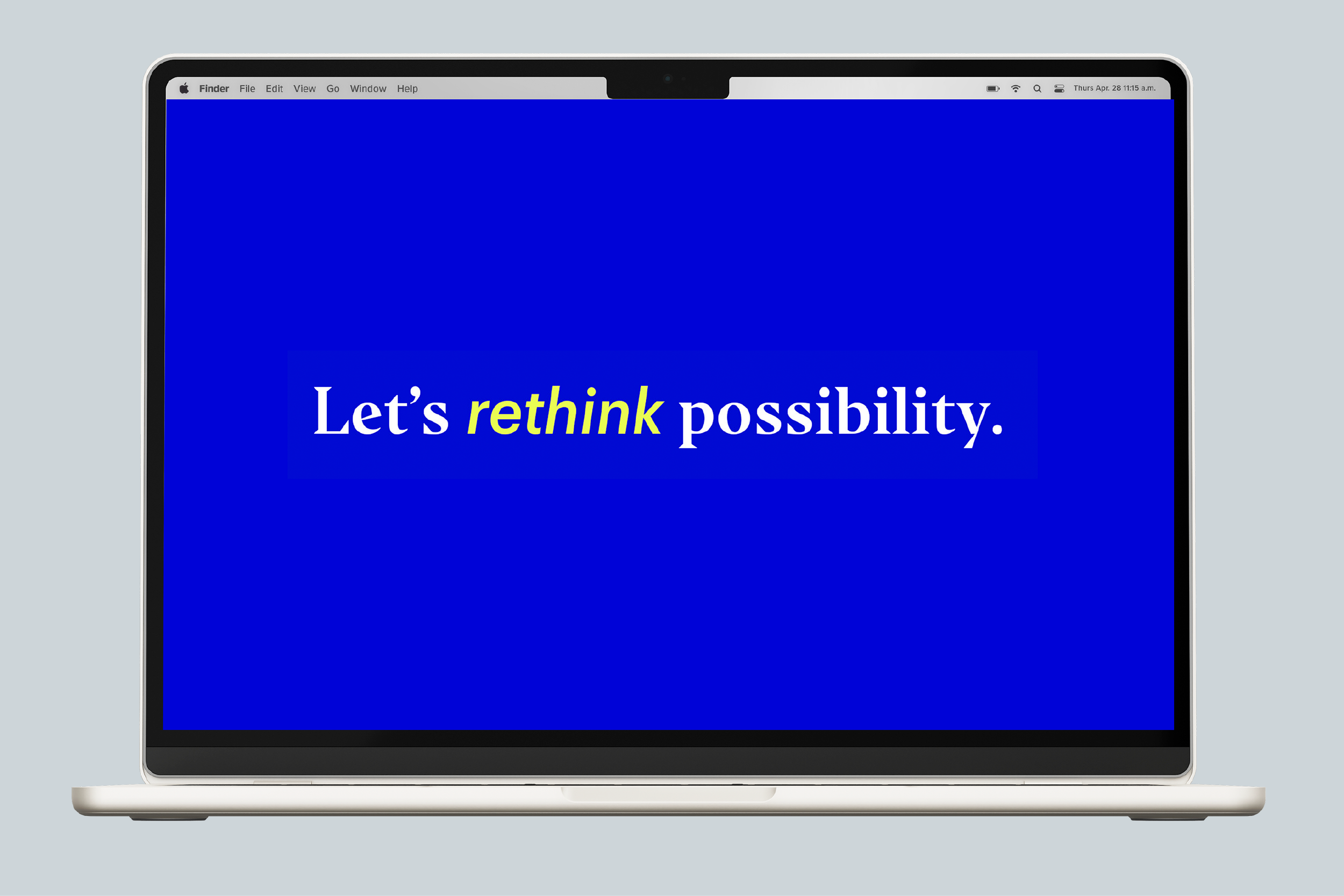 Laptop mockup displaying brand modernization concept with bold blue screen and headline 'Let’s rethink possibility