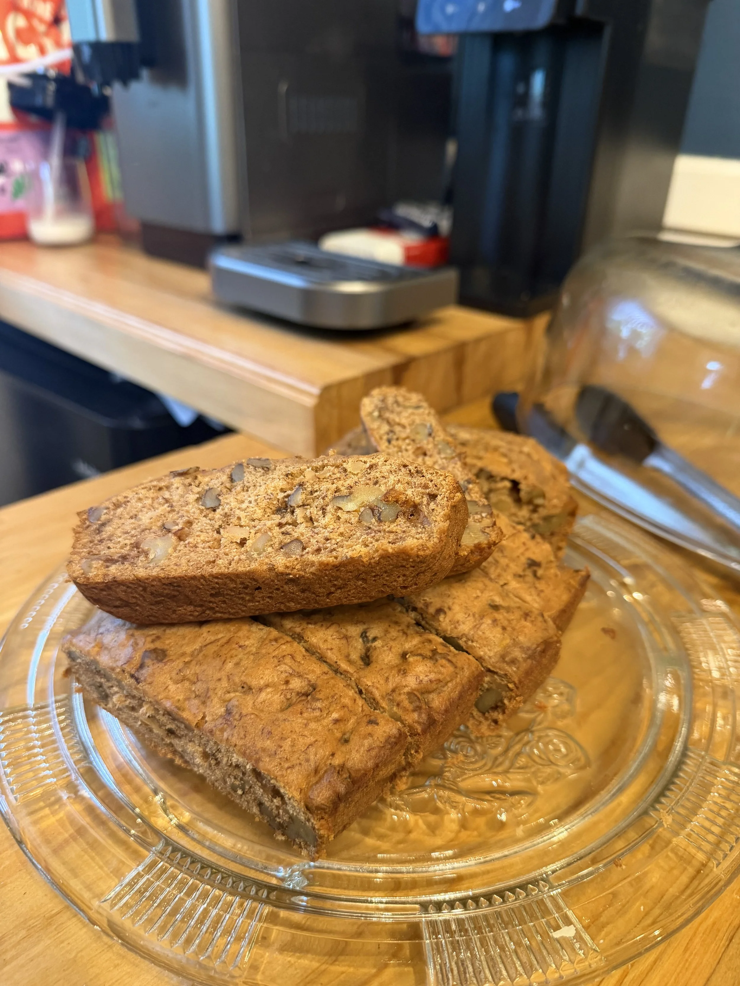 Banana bread, freshly made beside the coffee machine inside the coffee shop.
