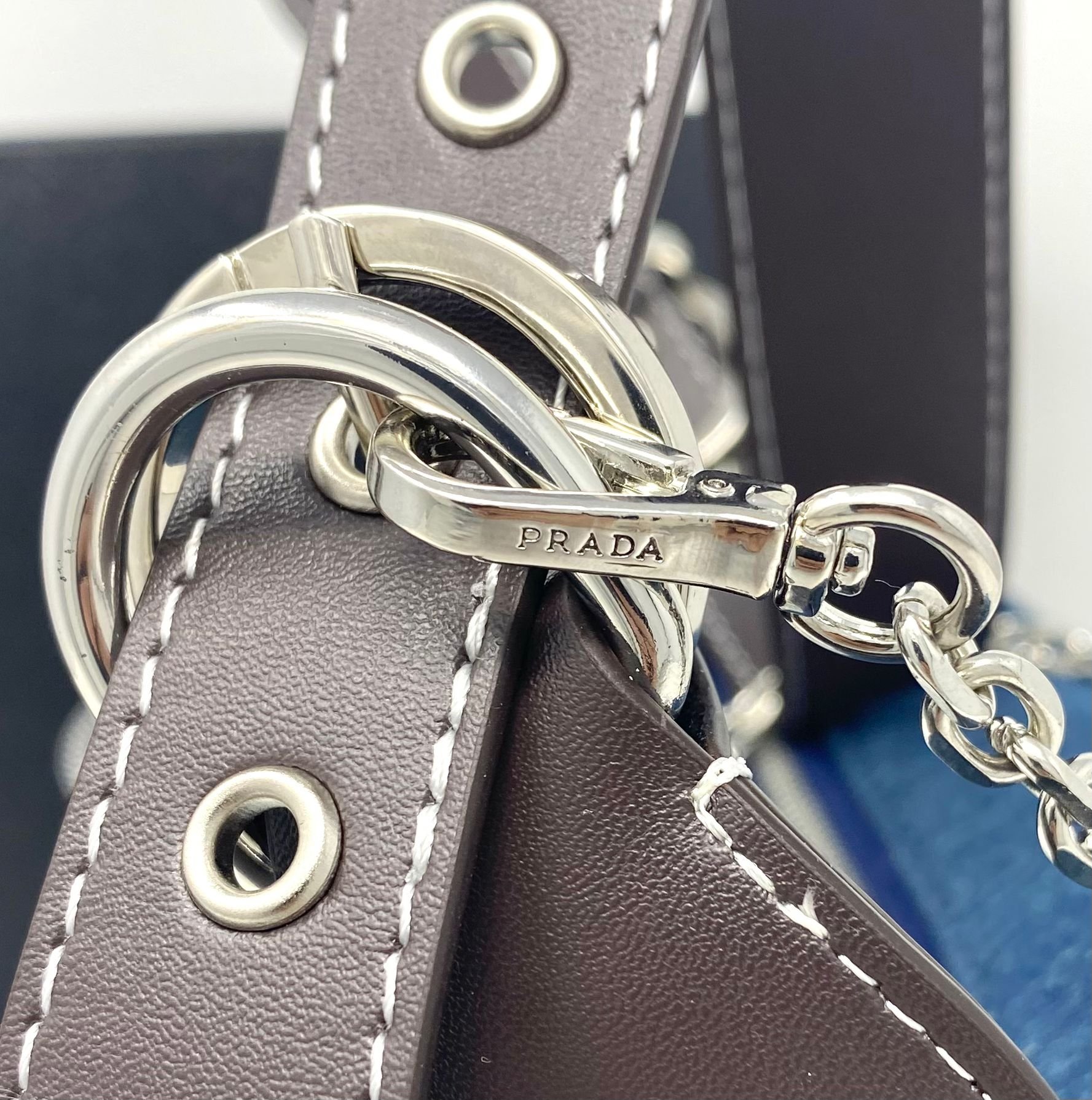 PRADA Milano Denim Shoulder Bag, Blue Canvas Mini Baguette Pochette, Silver Chain Strap, Adjustable Leather Handle, Boxed