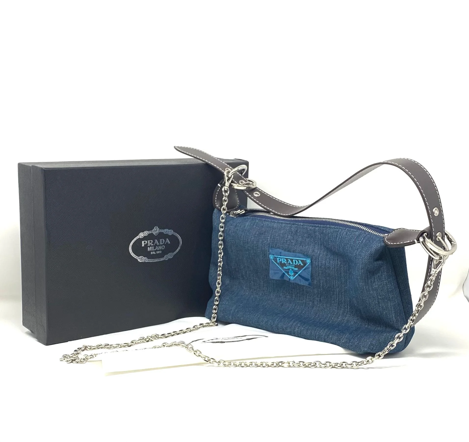 PRADA Milano Denim Shoulder Bag, Blue Canvas Mini Baguette Pochette, Silver Chain Strap, Adjustable Leather Handle, Boxed