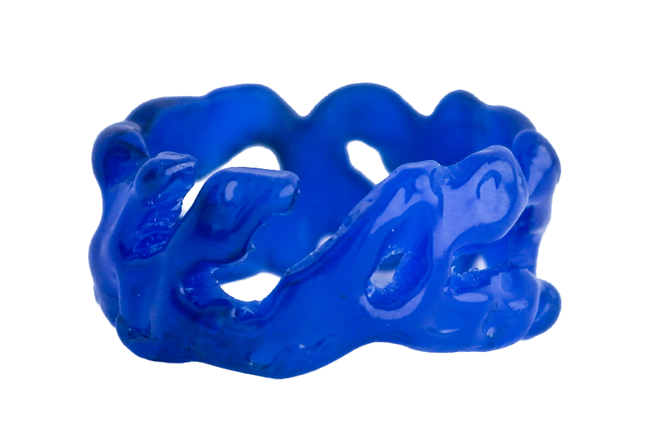 Close-up of a blue, irregularly shaped, hollow object that resembles a twisted or abstract sculpture.