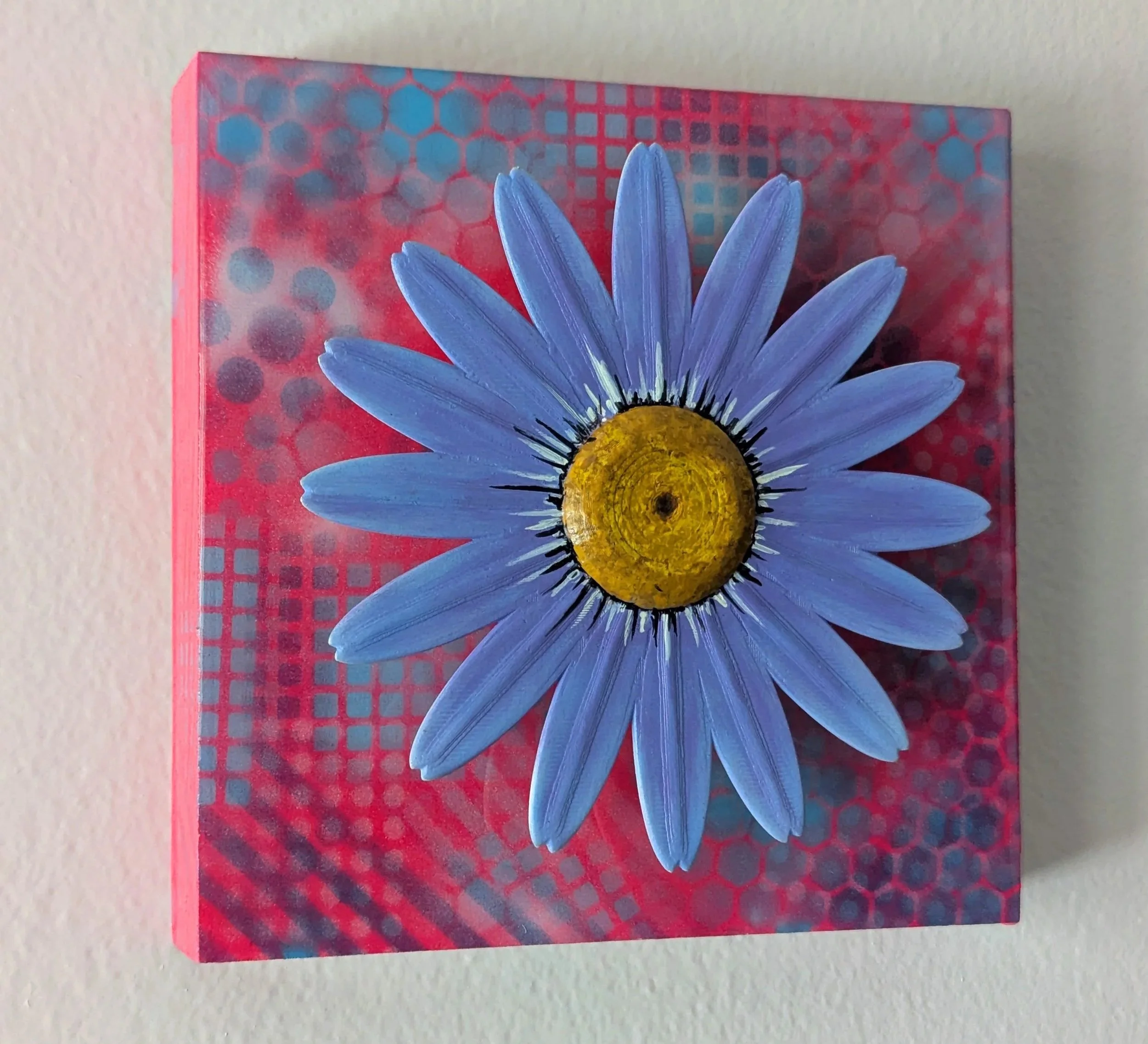 Pink painting with an elevated flower popping out of the painting