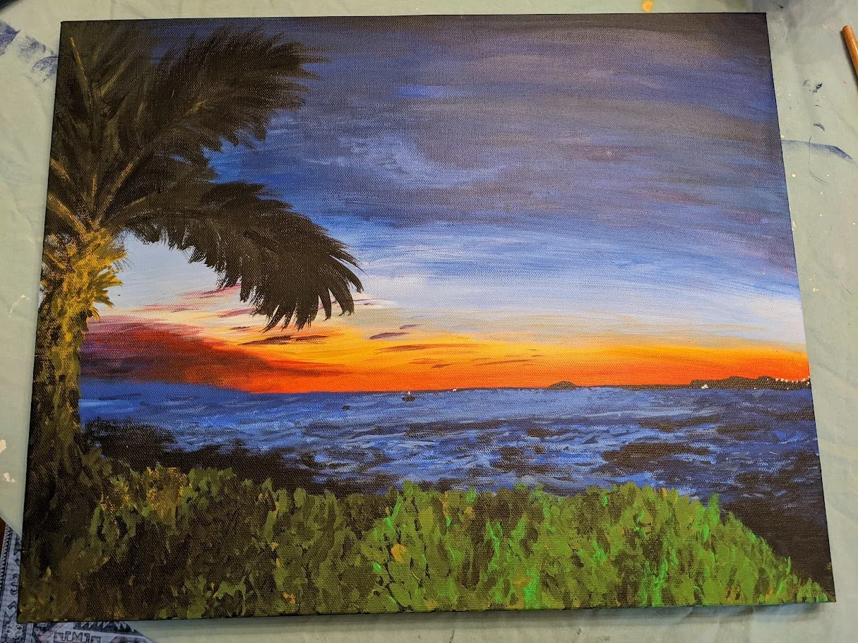 Painting of a sunset over the ocean with a palm tree on the left and green bushes in the foreground.