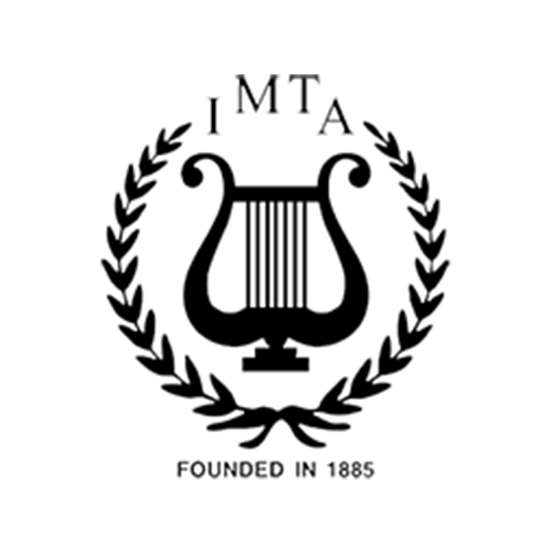 A black and white emblem featuring a lyre encircled by a laurel wreath with the letters 'I M T A' at the top and 'Founded in 1885' at the bottom.