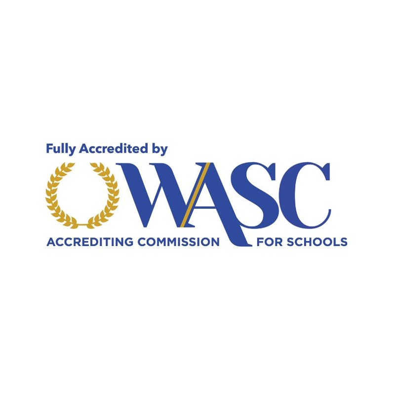 Logo of the Western Association of Schools and Colleges (WASC) with gold laurel wreath and blue text.