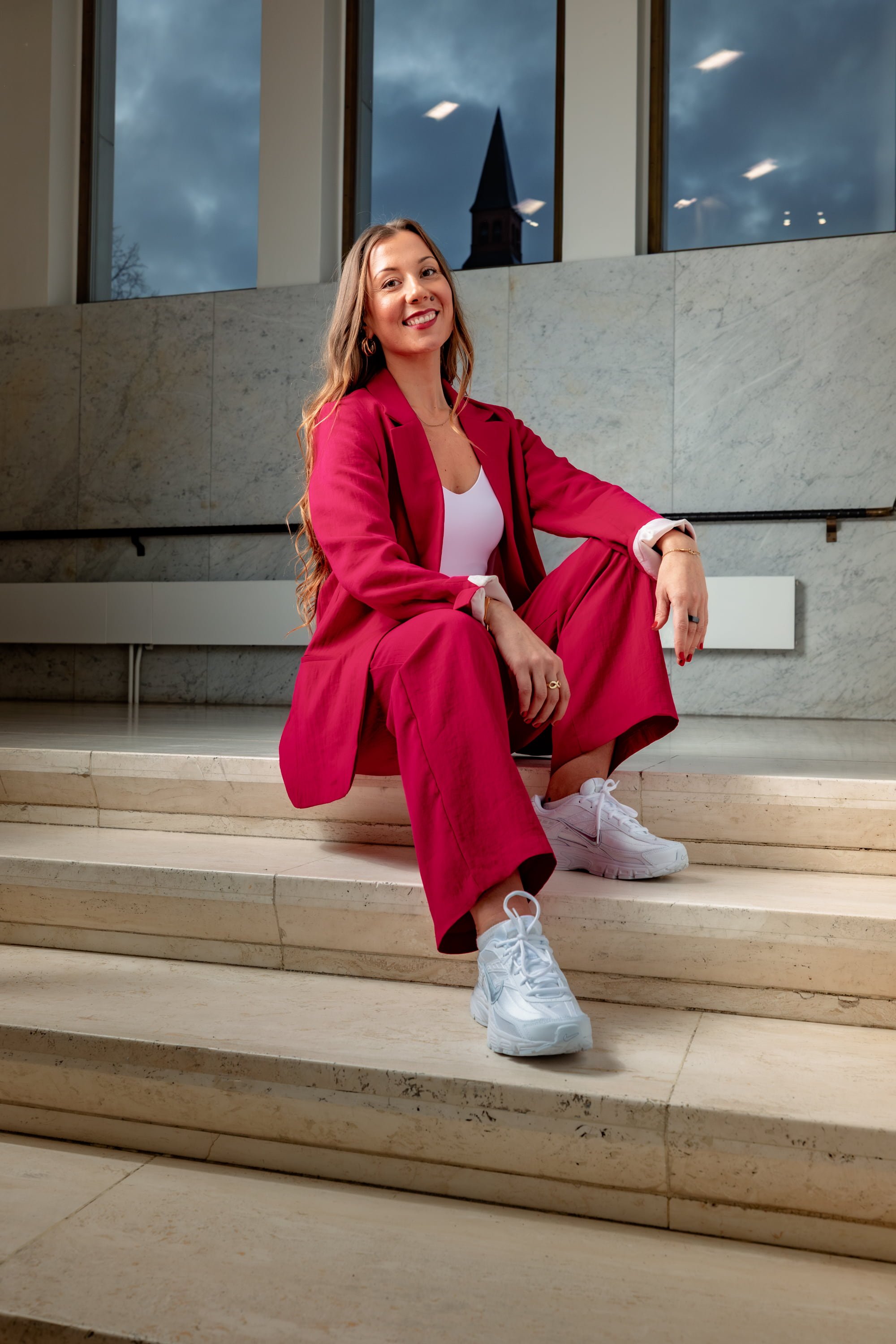 Vilma Tammilehto sitting and smiling