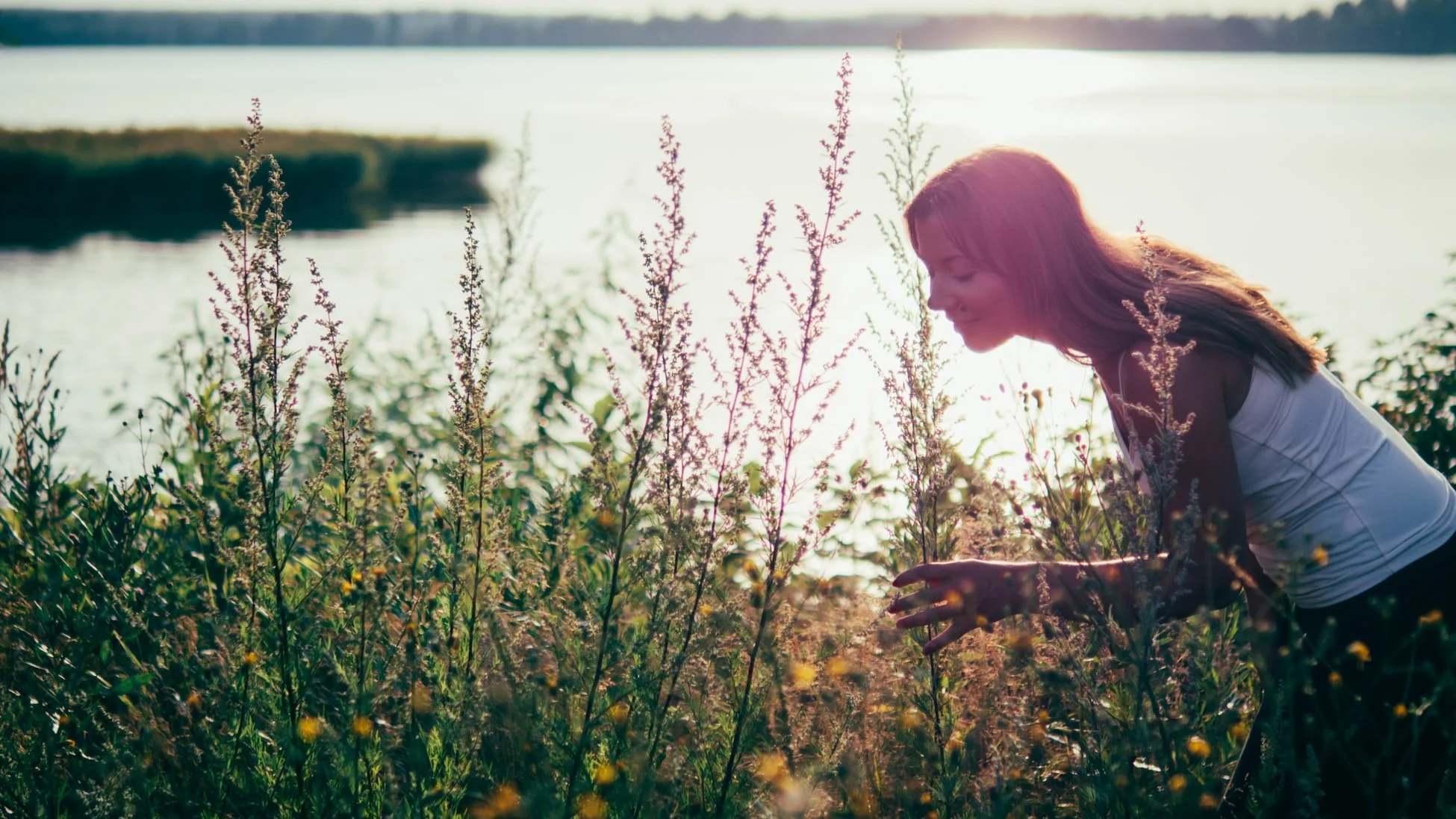 Vilma Tammilehto among wildflowers