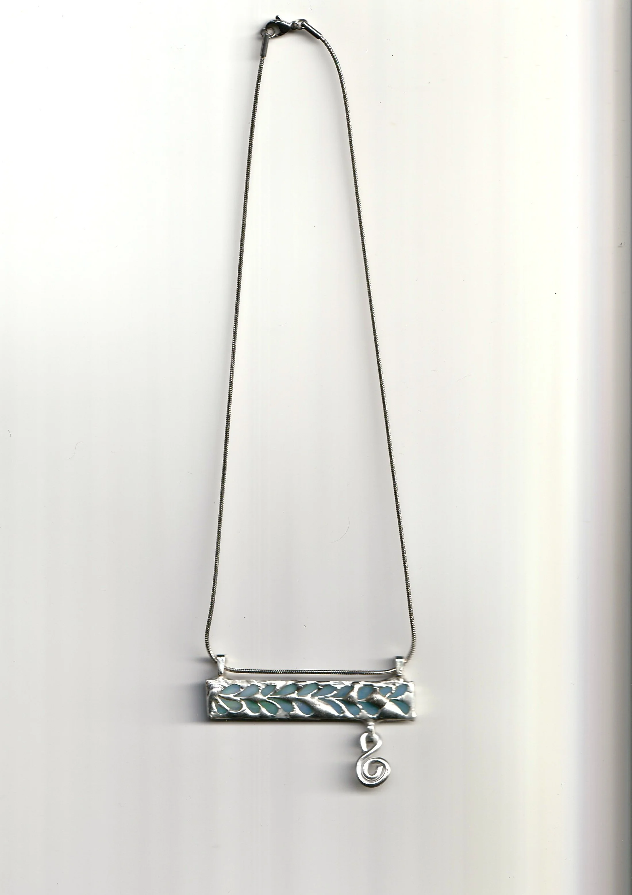 Cross Bar Swirl Charm