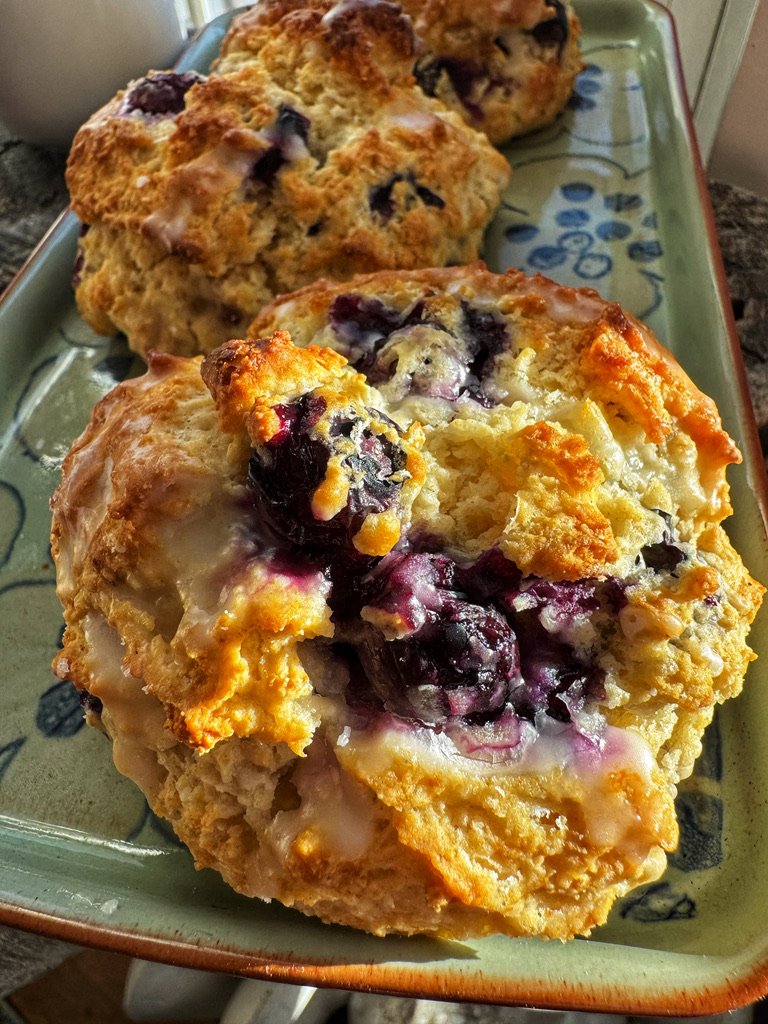Close up of blueberry scones on a decorative tray