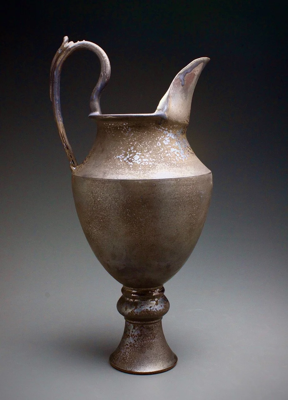 Bronze pouring vessel
