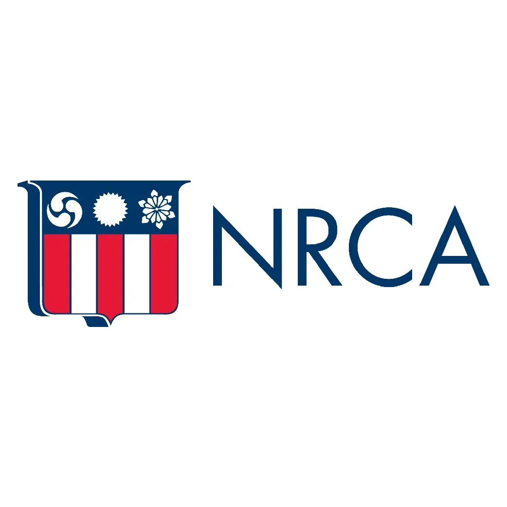 NRCA logo with shield featuring three symbols and the text 'NRCA'
