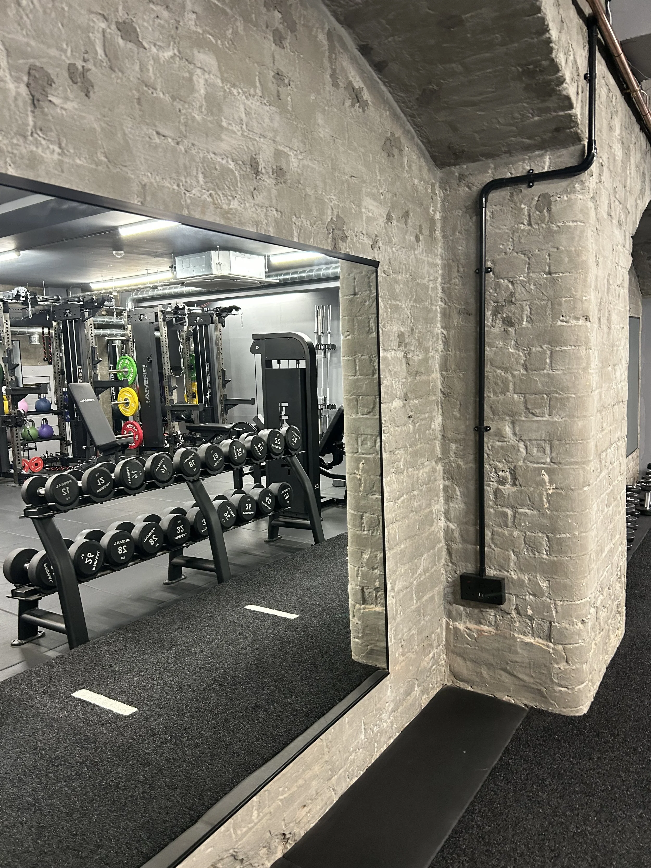 Sports therapist treating a client in a Central London clinic