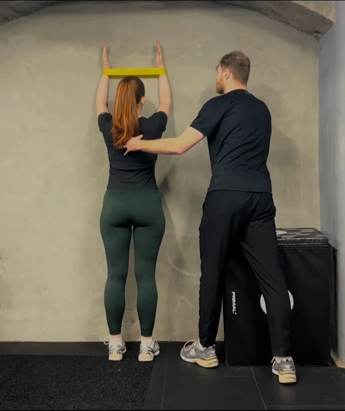 Sports therapist treating a client in a Central London clinic