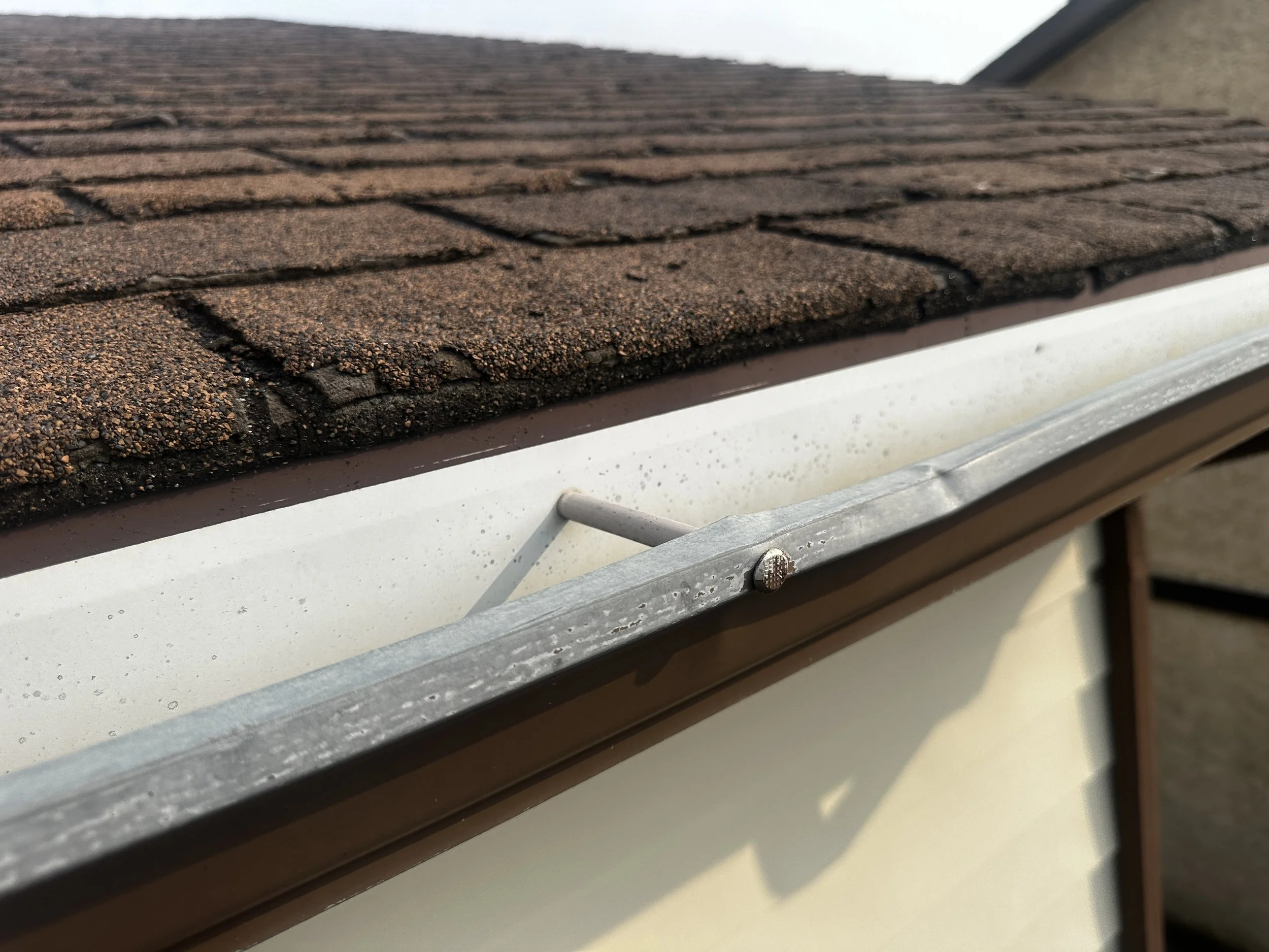 Close-up of an old gutter system.
