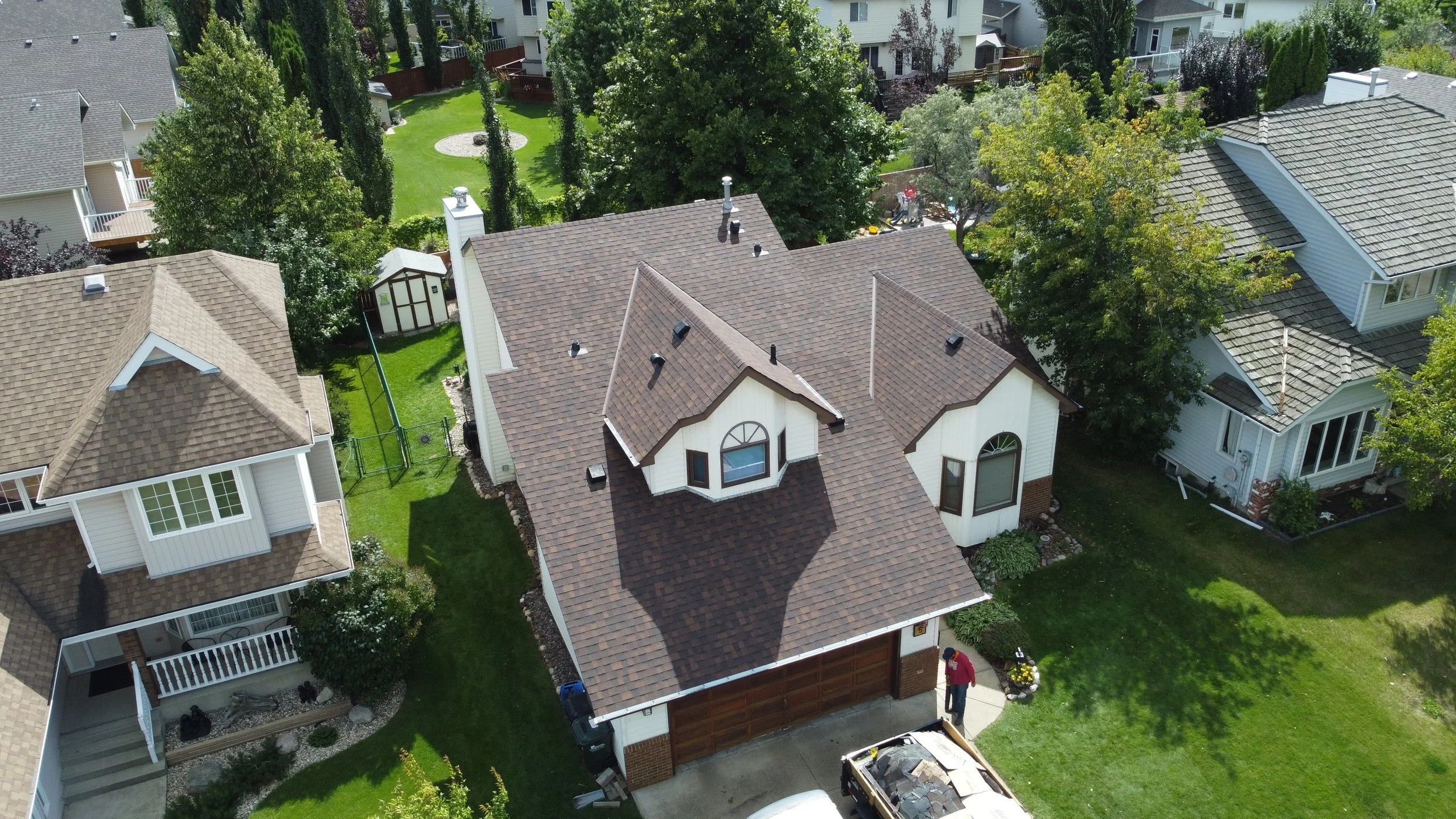 Owens corning brownwood shingles in a real roof in edmonton alberta