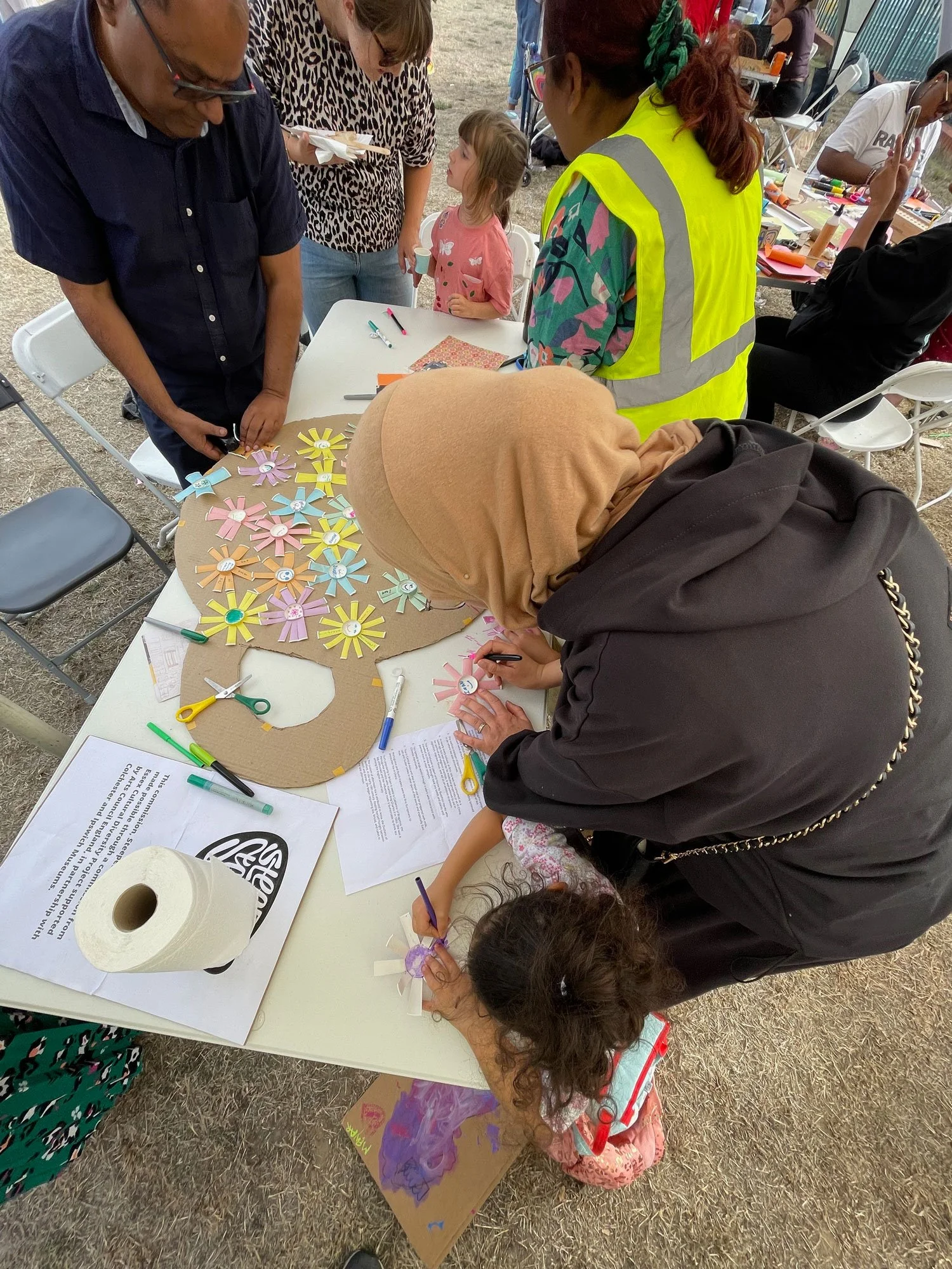 Young and old engaging with the artwork and the experience.