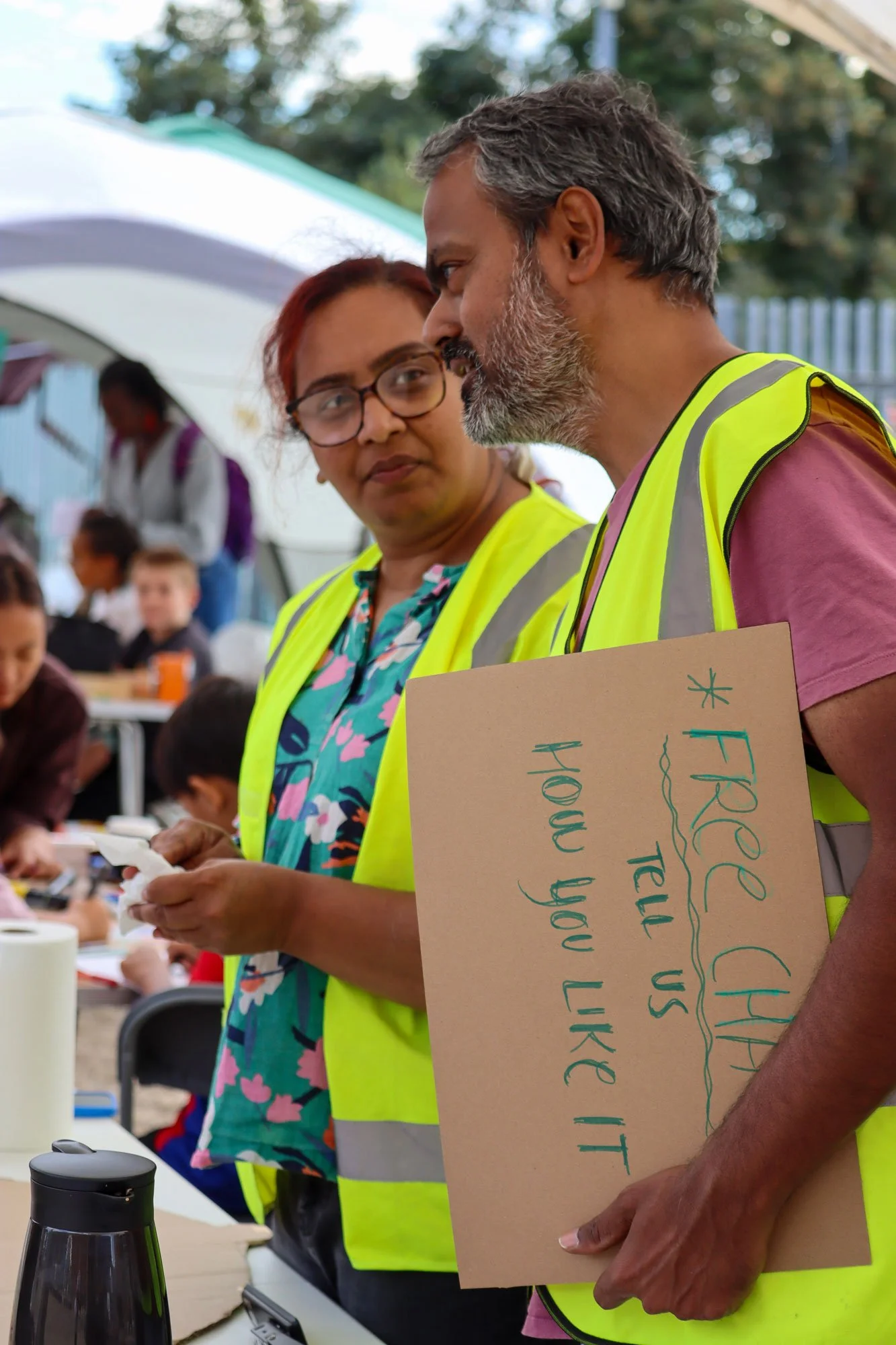 Anisha and Dwarka deep in conversation with one of the community members.