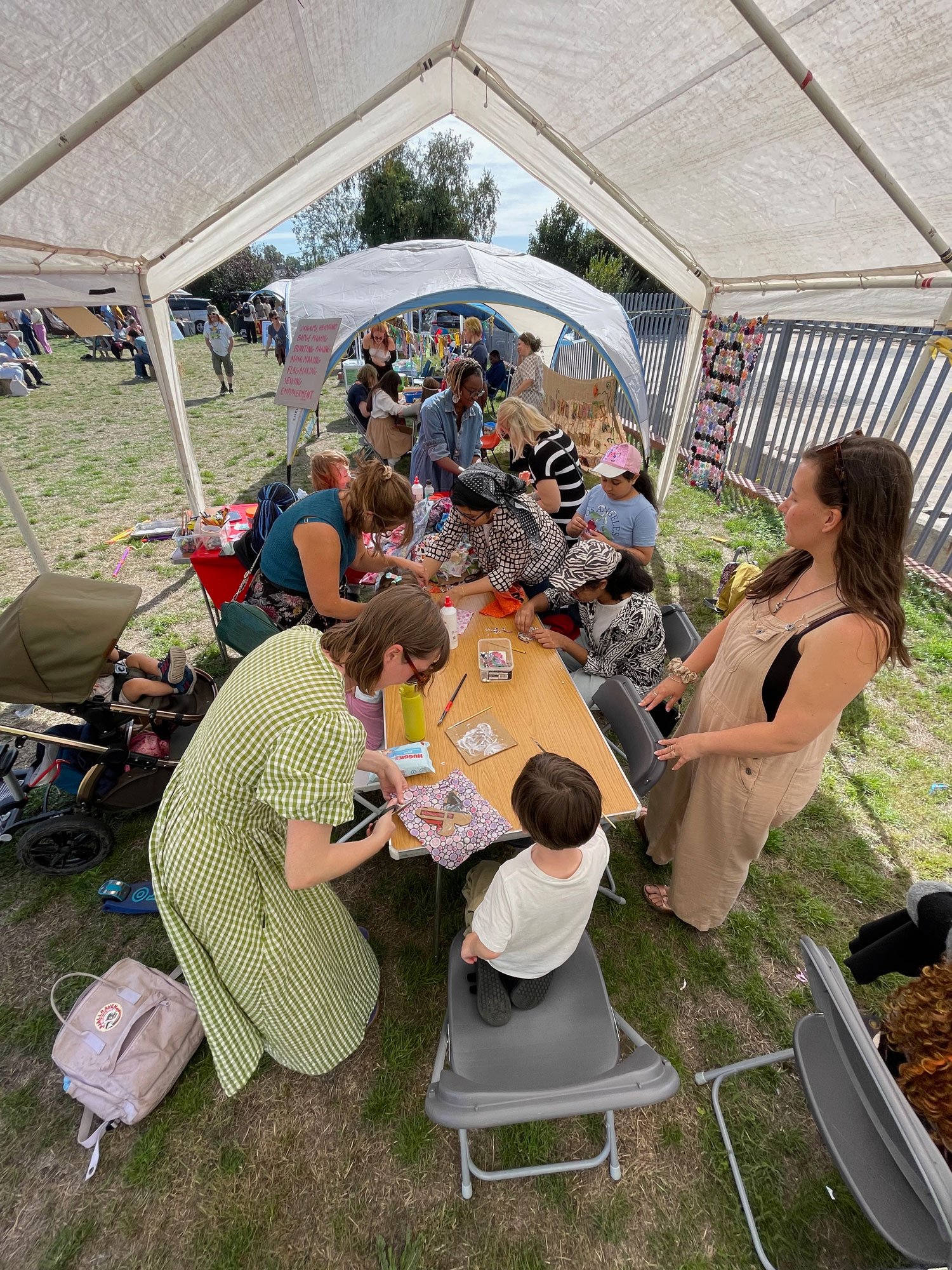Visitors trying out block printing on fabric.