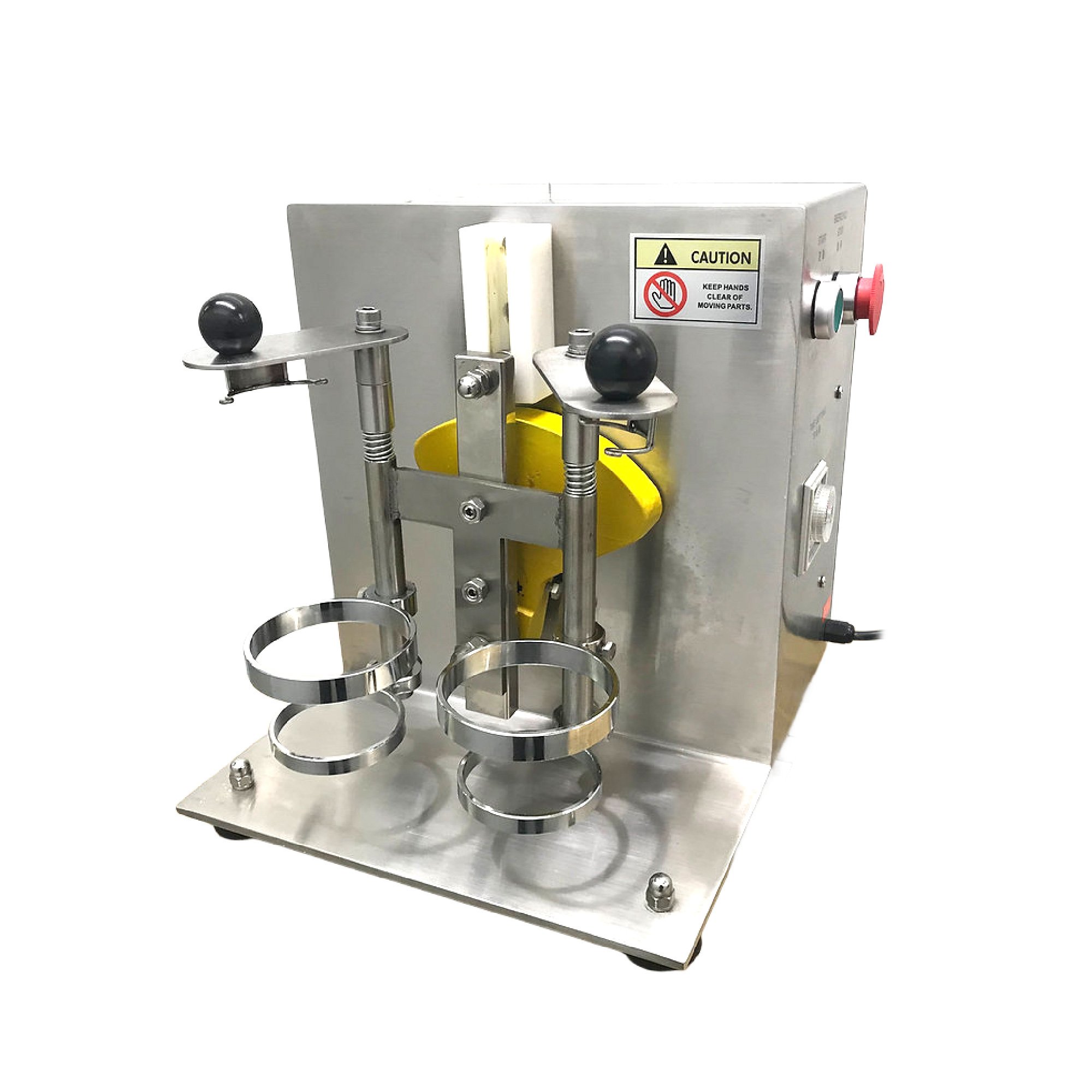 A laboratory machine with metal rings, vertical metal rods, and black and red control buttons, used for scientific or industrial purposes.