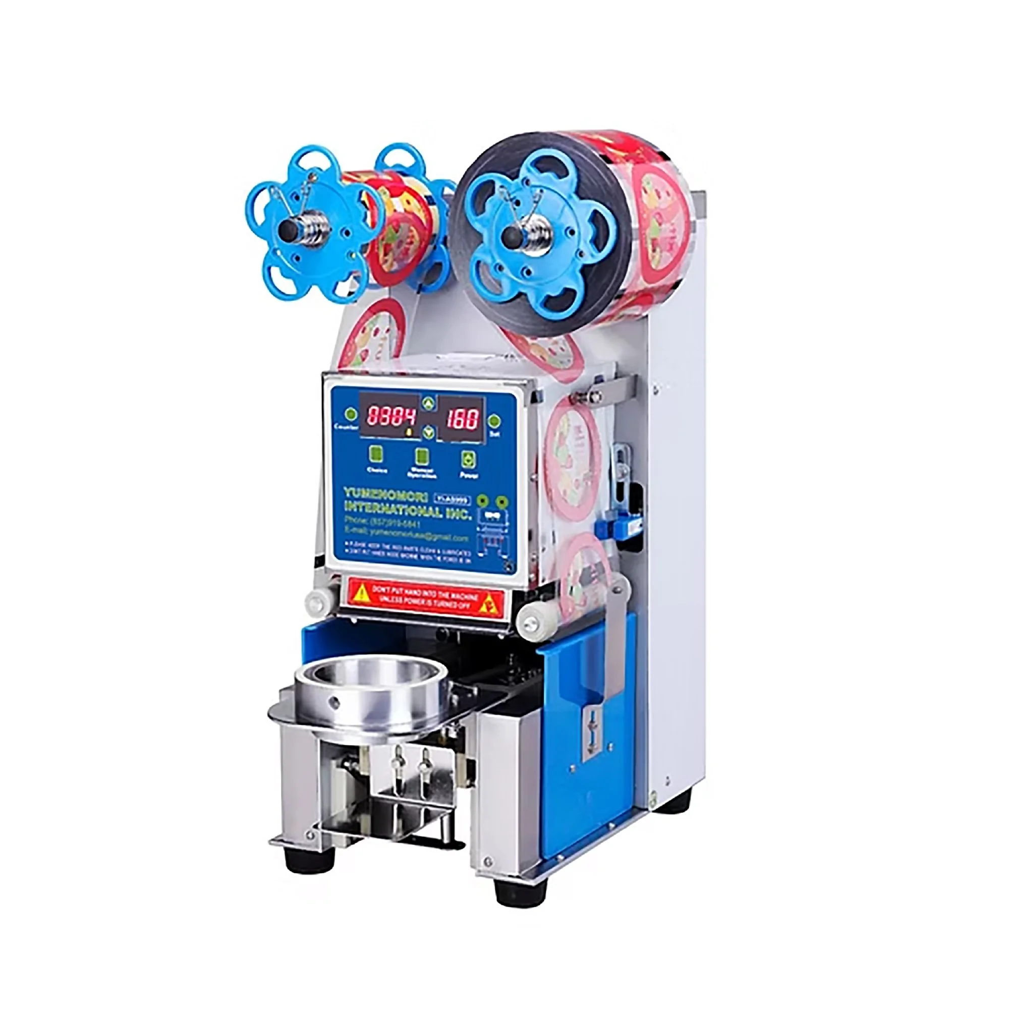 Miniature cotton candy machine with blue and pink decorations and a stainless steel bowl for spinning sugar.