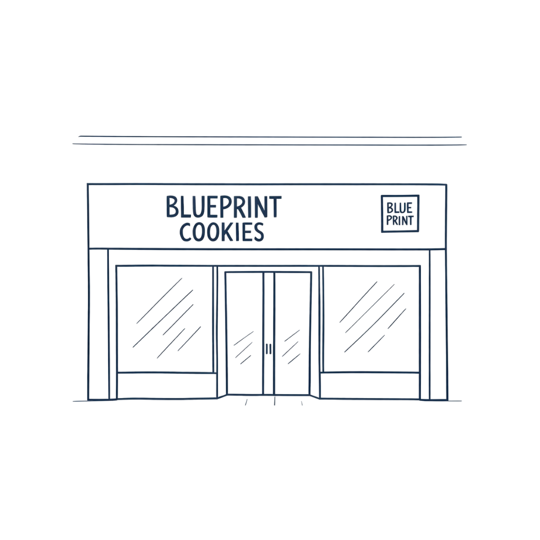 Outline of a storefront with signs that read "BluePrint Cookies" and "Blue Print" above double glass doors, with large windows on each side.
