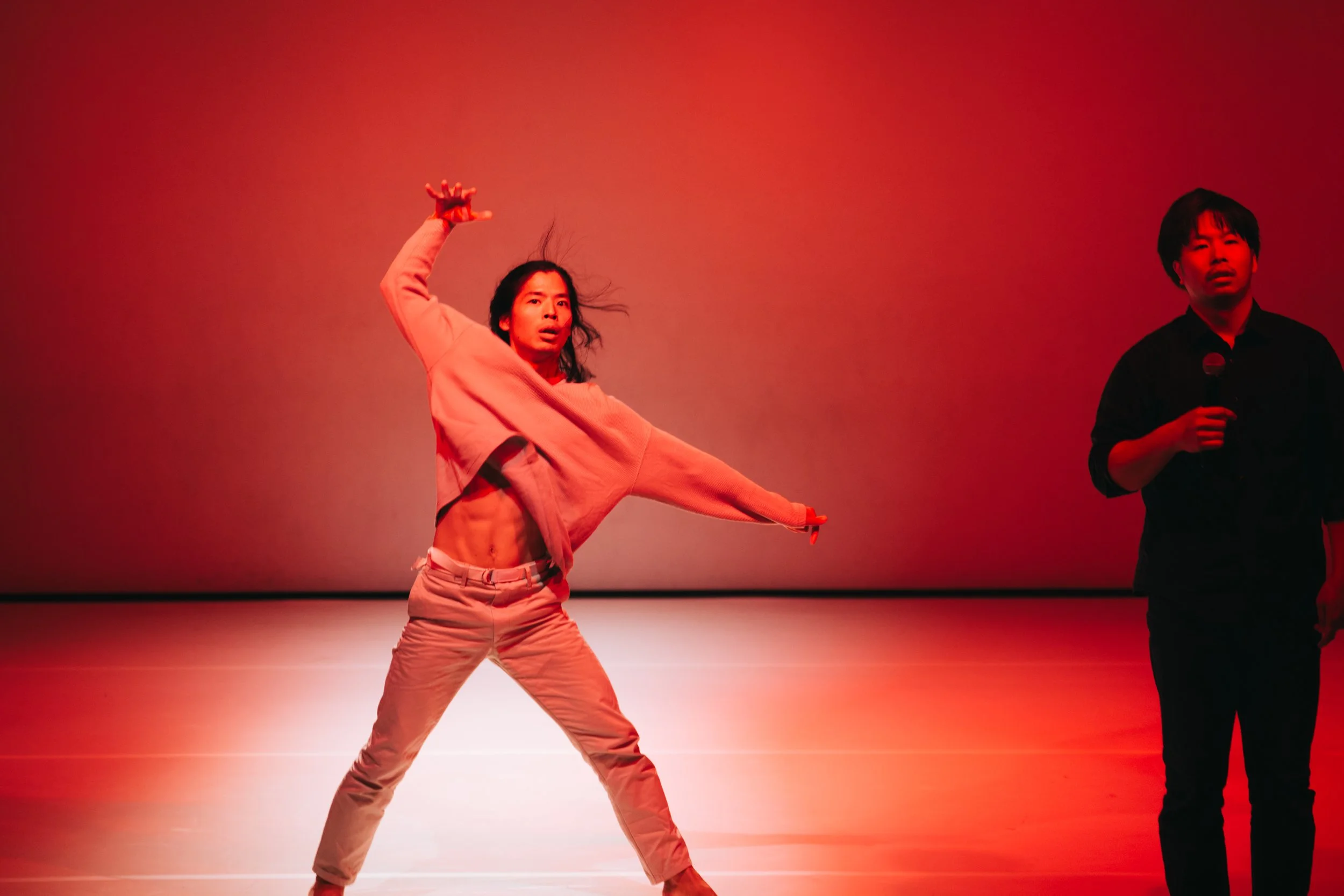 Endo Ryonosuke dancing while Kazuma Yamamoto stands with a microphone in Total Beings | Burning Hearts.