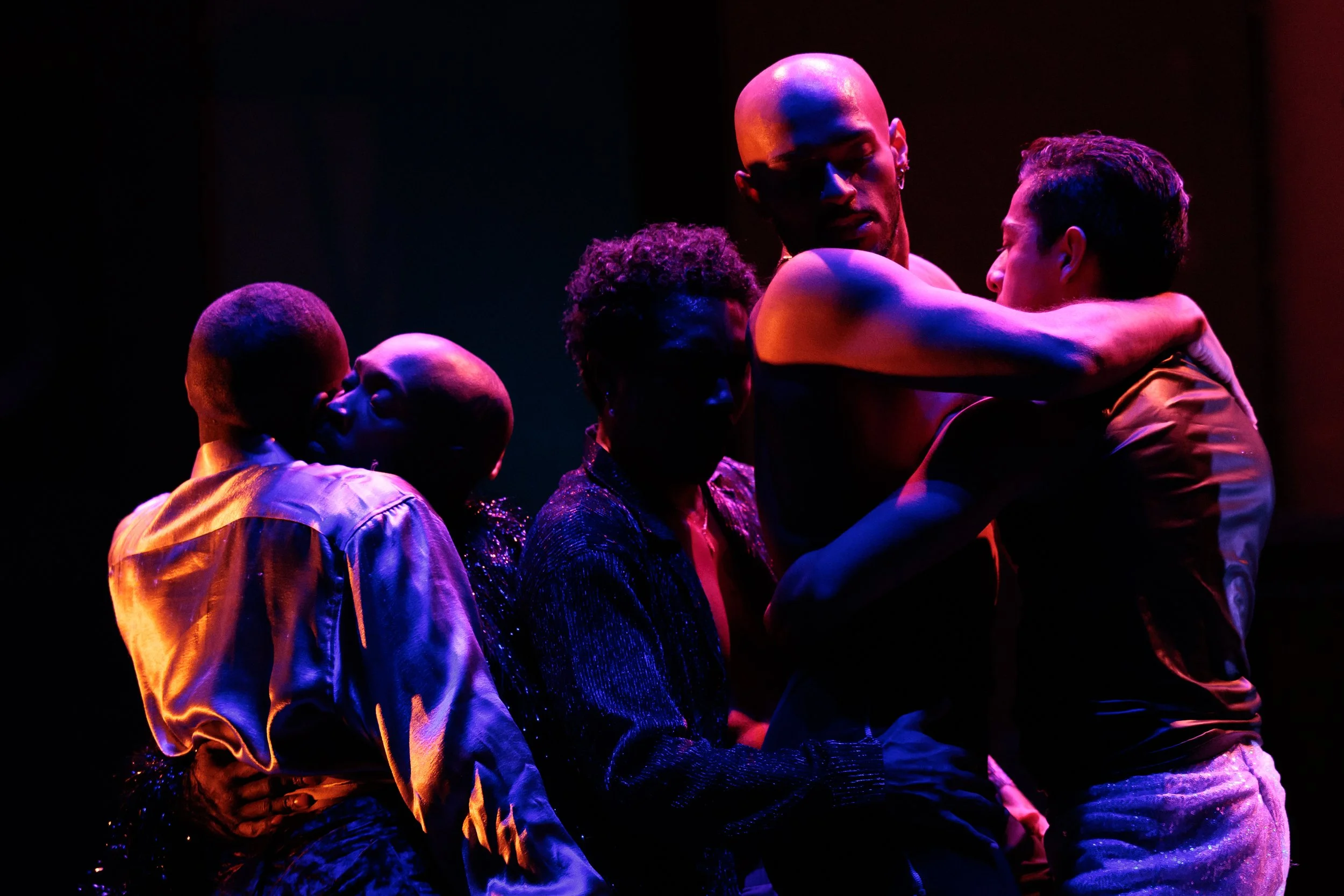 Six performers embracing and kissing in Sissies: Something Perfect Between Ourselves.